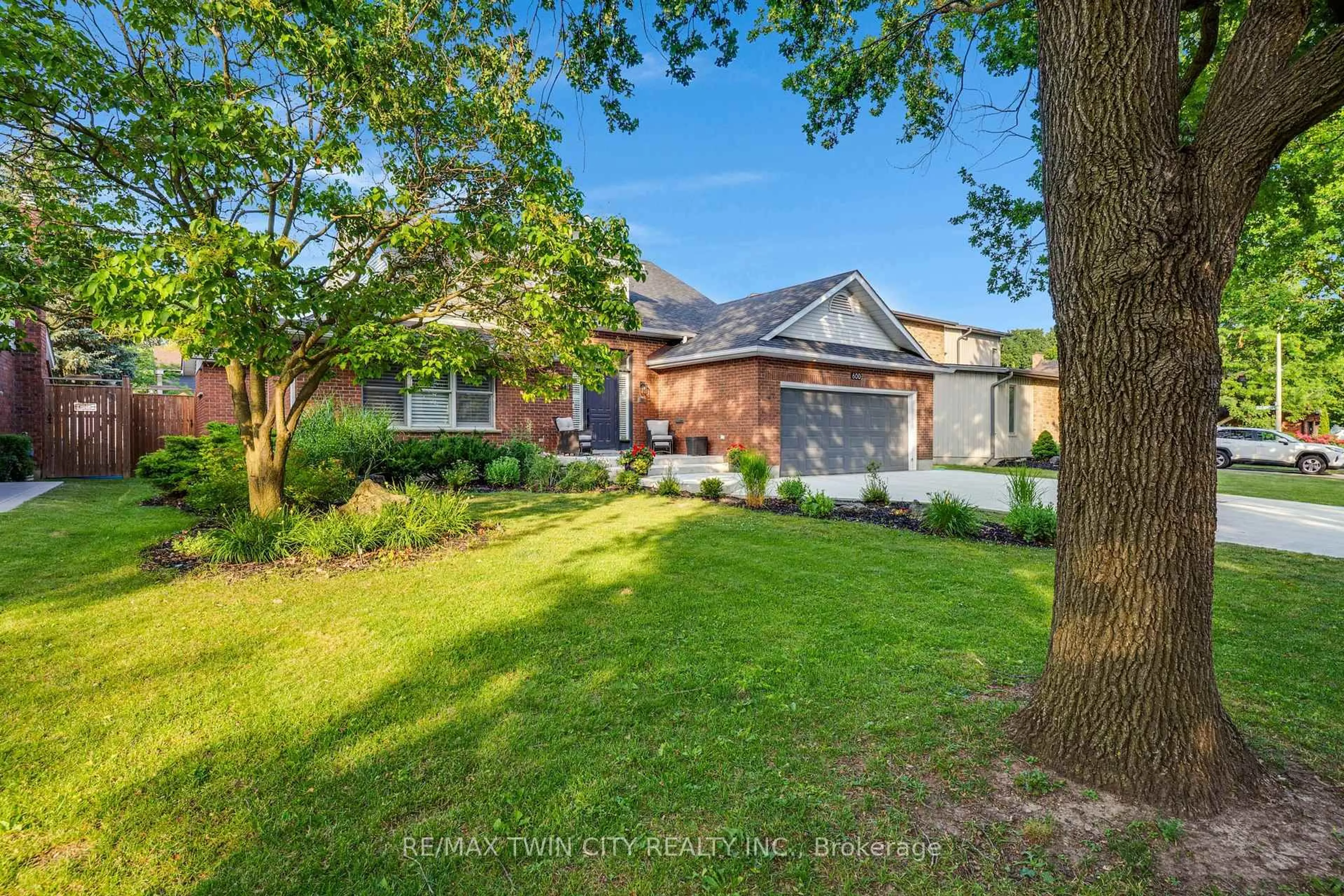 Home with brick exterior material, street for 600 Coppercroft Crt, Waterloo Ontario N2K 3M2