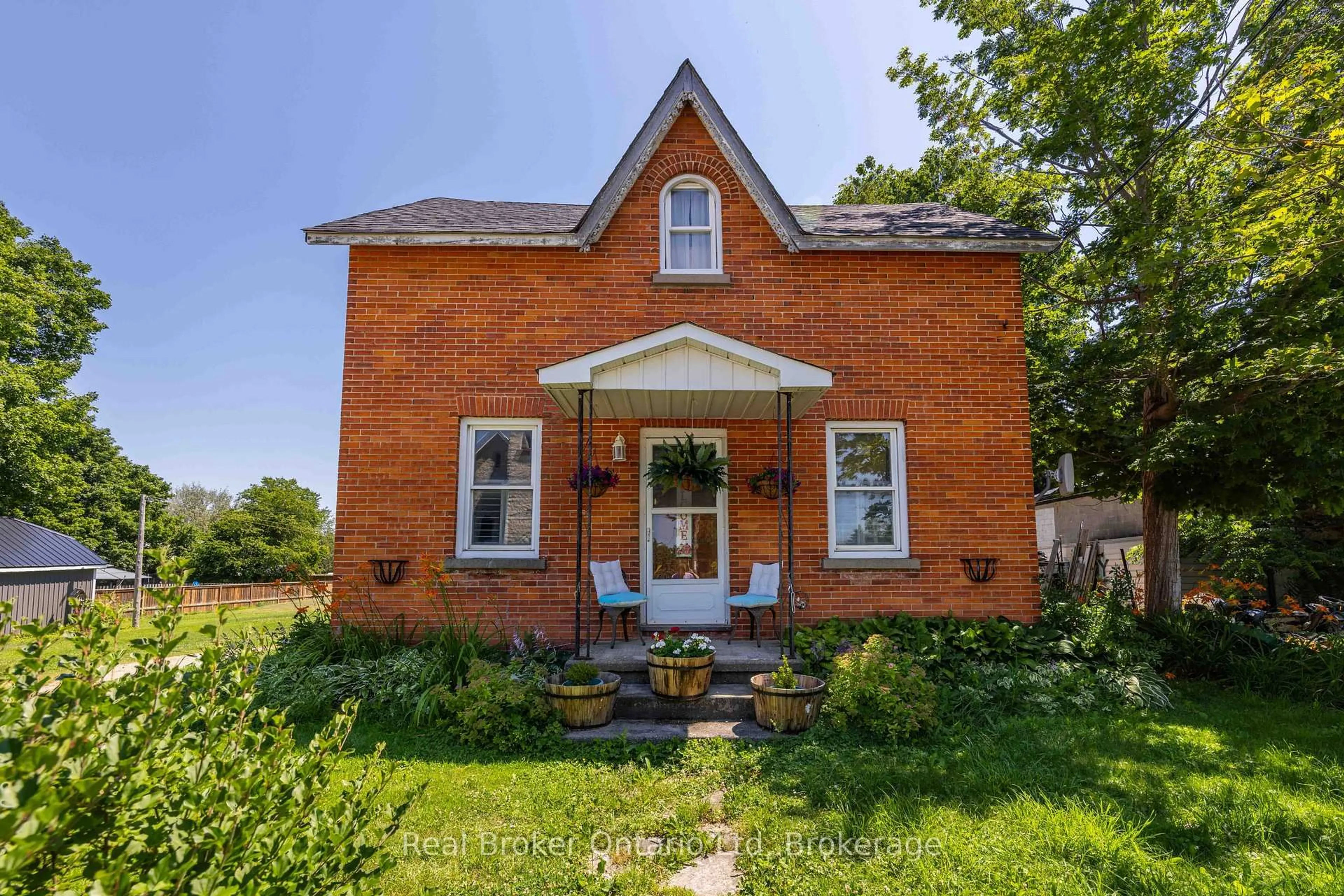 Home with brick exterior material, street for 117005 Grey 3 Rd, Georgian Bluffs Ontario N0H 2N0