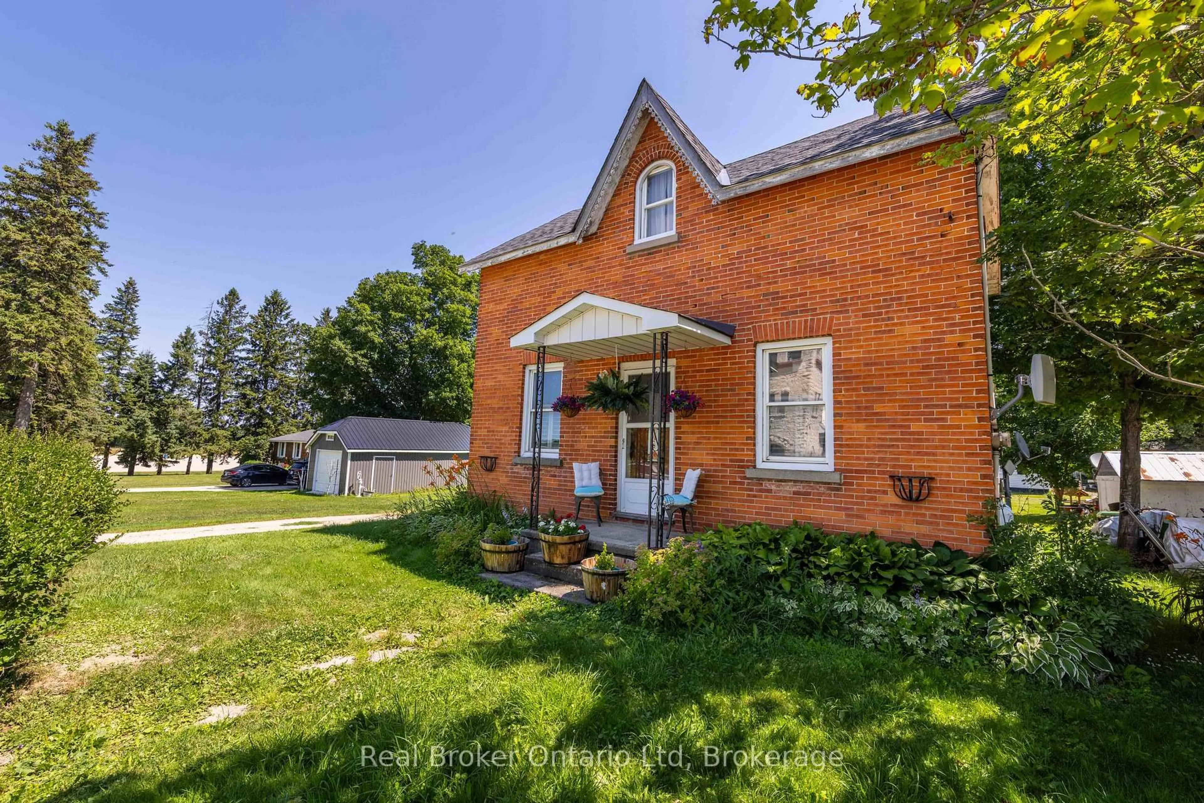 Home with brick exterior material, street for 117005 Grey 3 Rd, Georgian Bluffs Ontario N0H 2N0