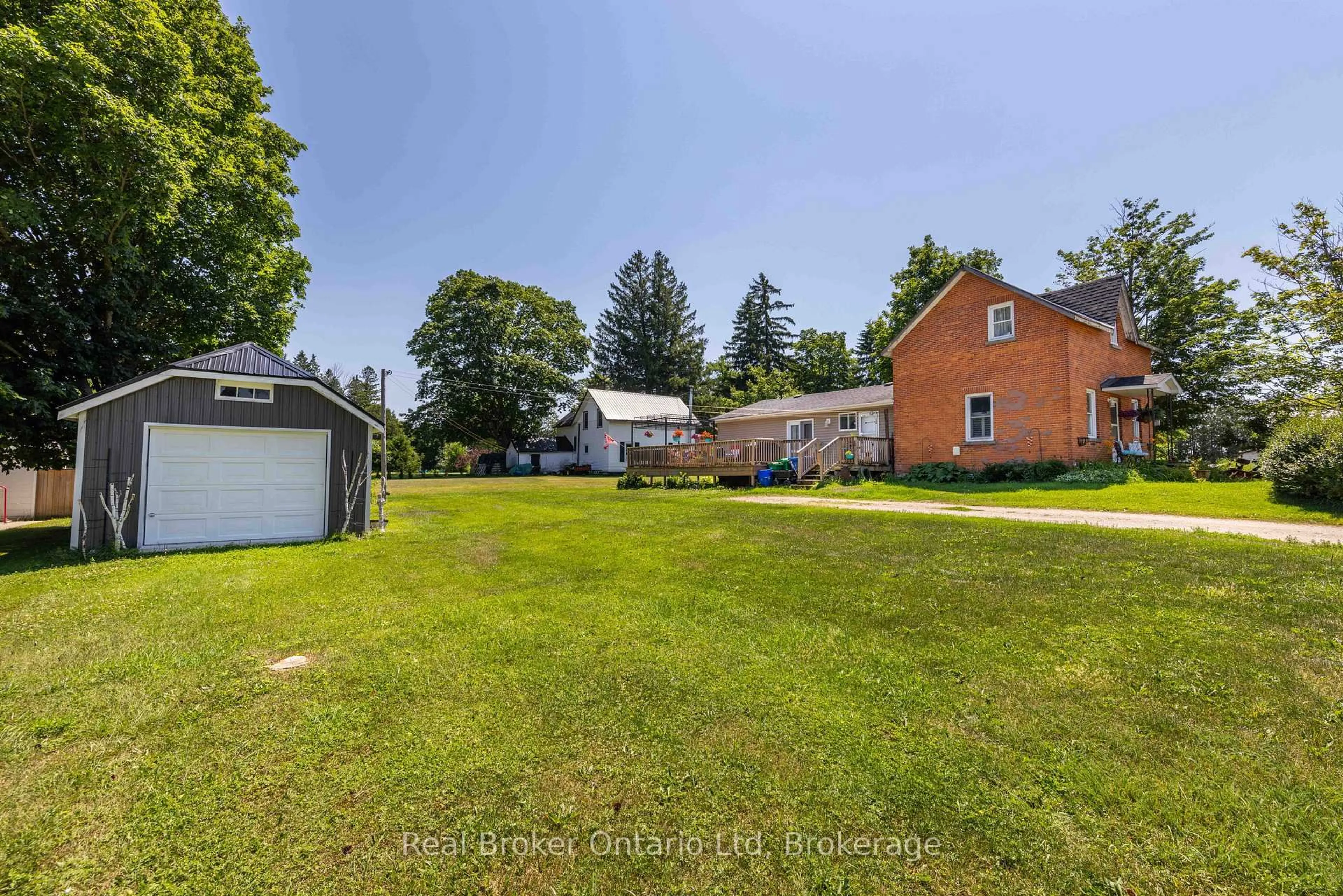 A pic from outside/outdoor area/front of a property/back of a property/a pic from drone, unknown for 117005 Grey 3 Rd, Georgian Bluffs Ontario N0H 2N0