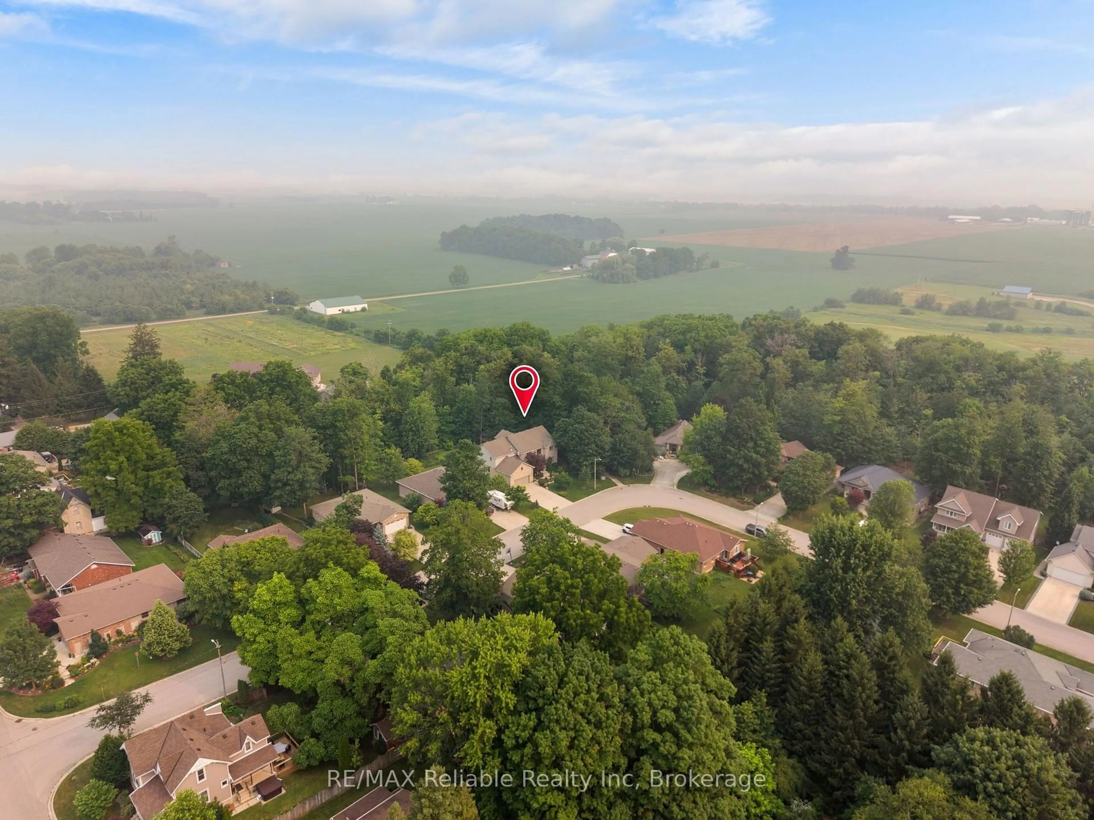 A pic from outside/outdoor area/front of a property/back of a property/a pic from drone, water/lake/river/ocean view for 77 West St, Huron East Ontario N0K 1W0