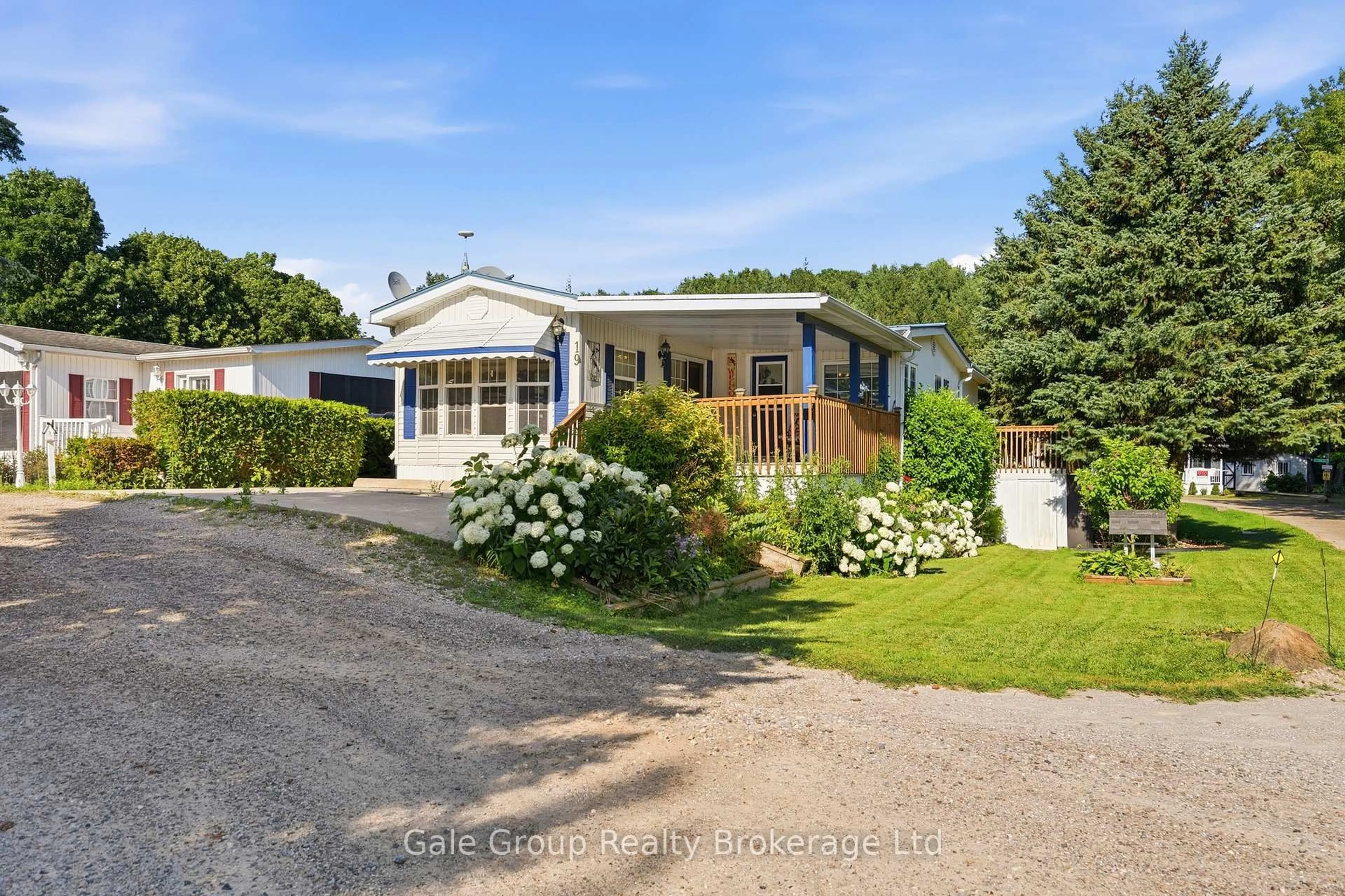 A pic from outside/outdoor area/front of a property/back of a property/a pic from drone, street for 592968 Oxford Road 13 #19, Norwich Ontario N0J 1P0