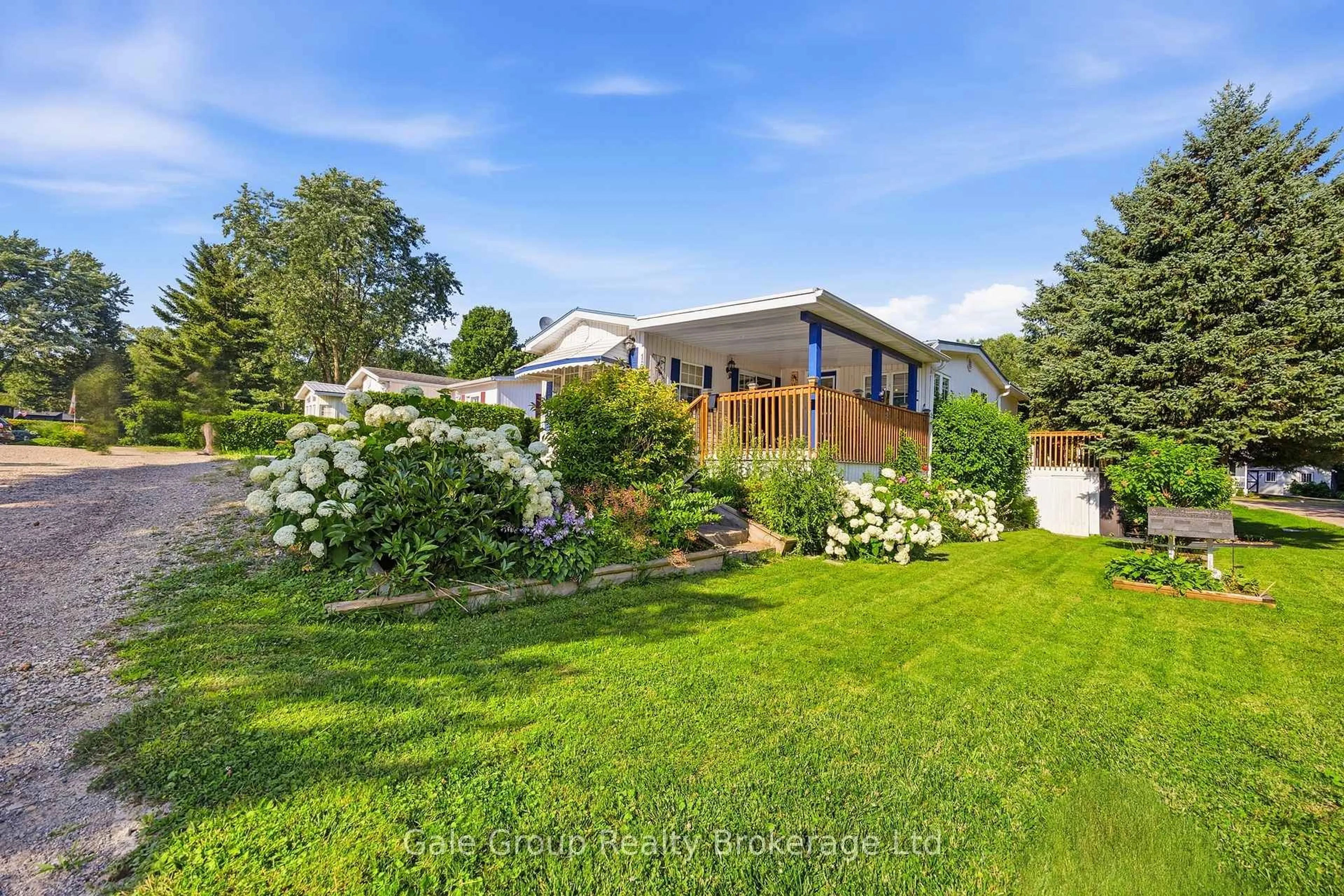 A pic from outside/outdoor area/front of a property/back of a property/a pic from drone, street for 592968 Oxford Road 13 #19, Norwich Ontario N0J 1P0