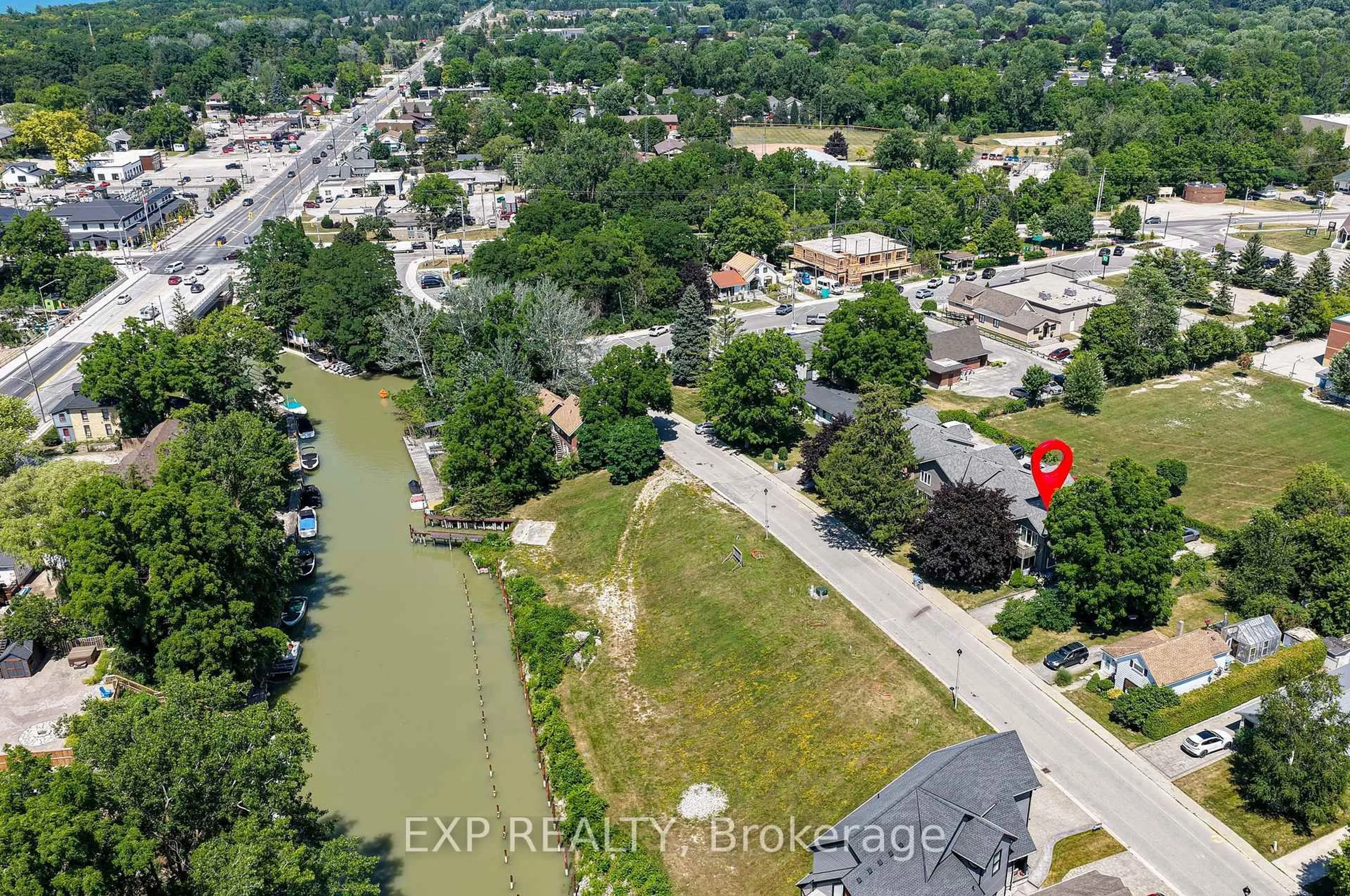 A pic from outside/outdoor area/front of a property/back of a property/a pic from drone, water/lake/river/ocean view for 18 Sauble River Rd #8, Lambton Shores Ontario N0M 1T0