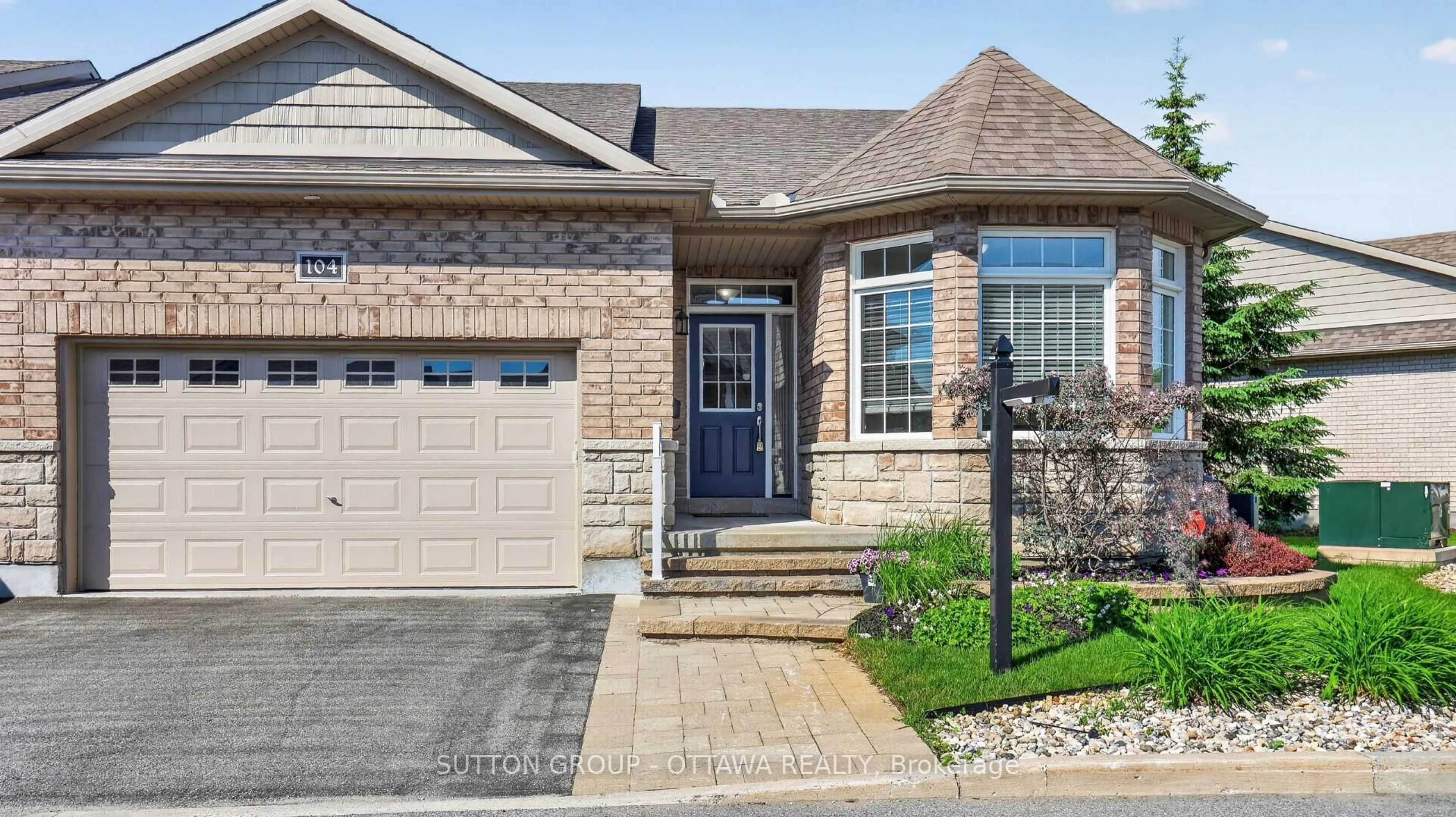 Home with brick exterior material, street for 104 Passageway Private, Kanata Ontario K2M 1H6