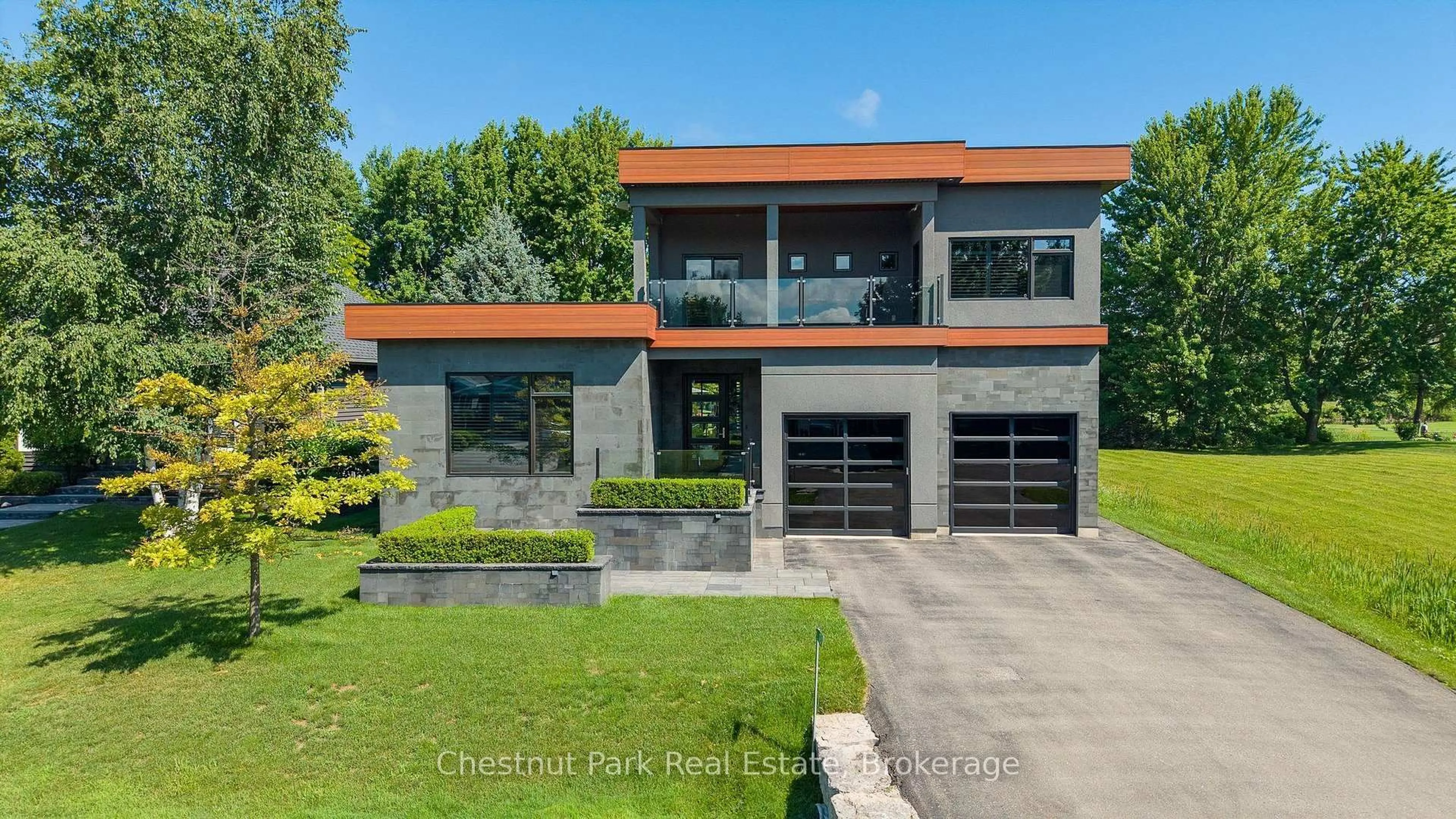 Home with brick exterior material, street for 131 Grand Cypress Lane, Blue Mountains Ontario L9Y 0K7