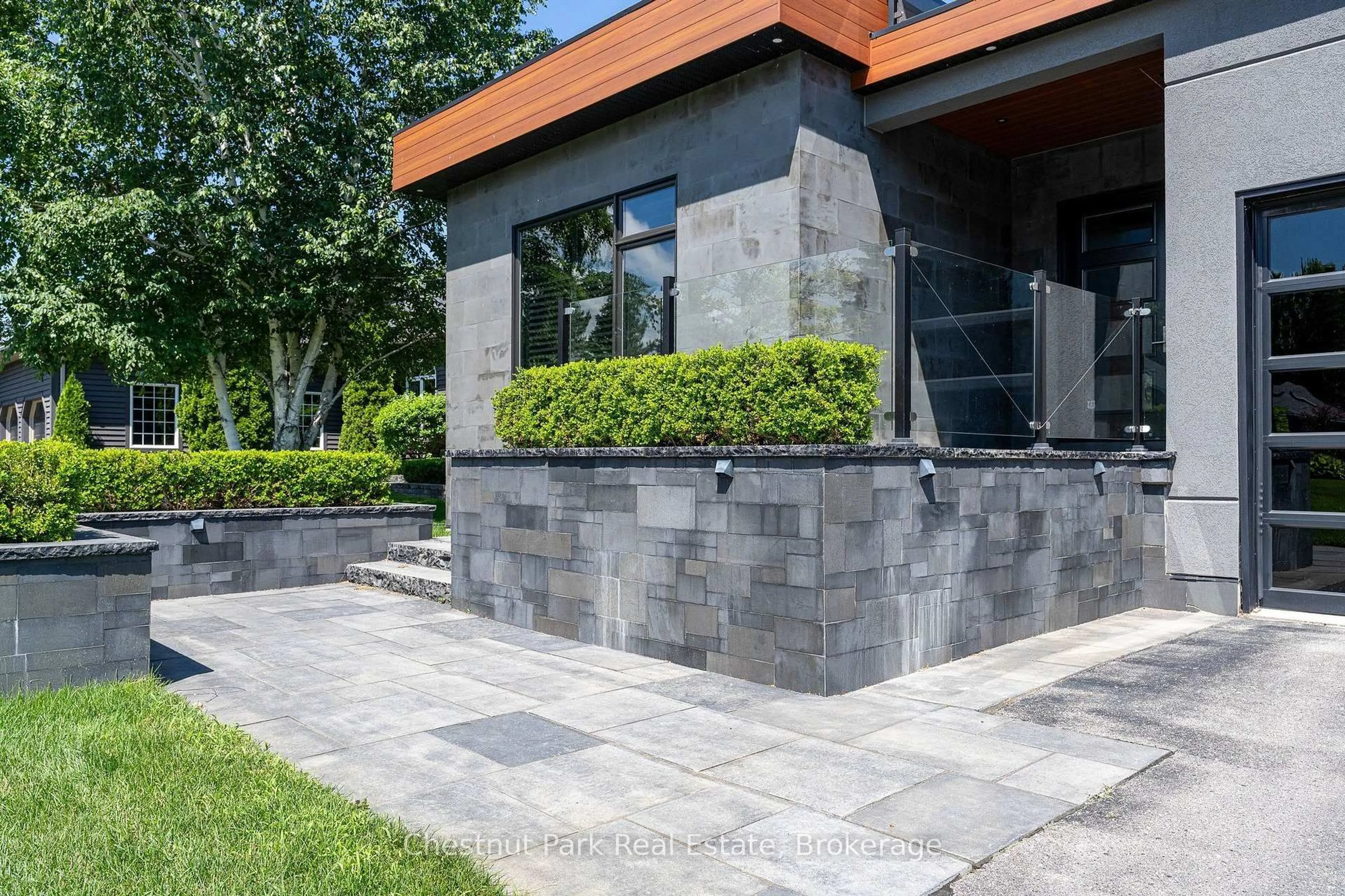 Home with brick exterior material, street for 131 Grand Cypress Lane, Blue Mountains Ontario L9Y 0K7