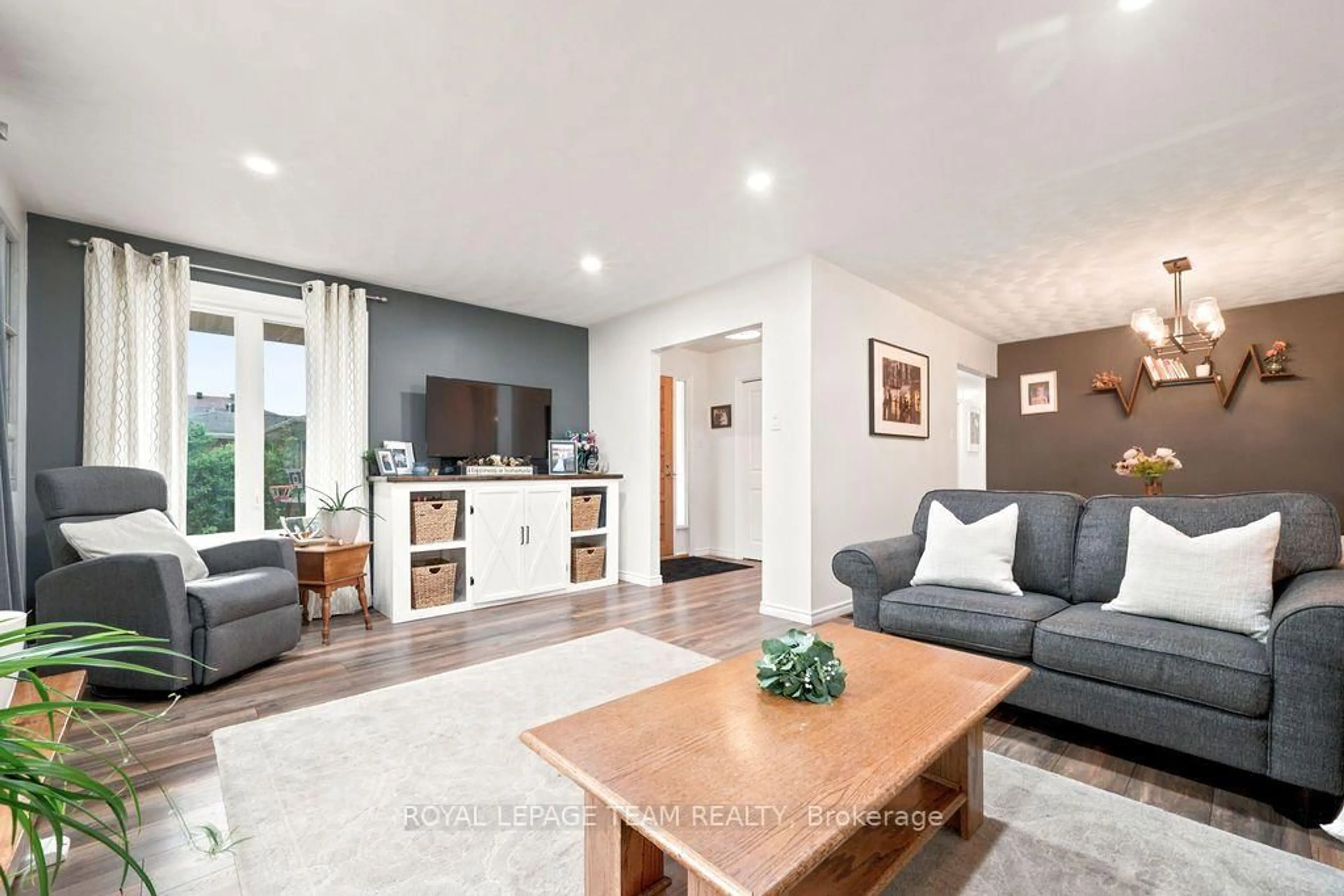 Living room with furniture, wood/laminate floor for 438 Raglan St, Renfrew Ontario K7V 1P5