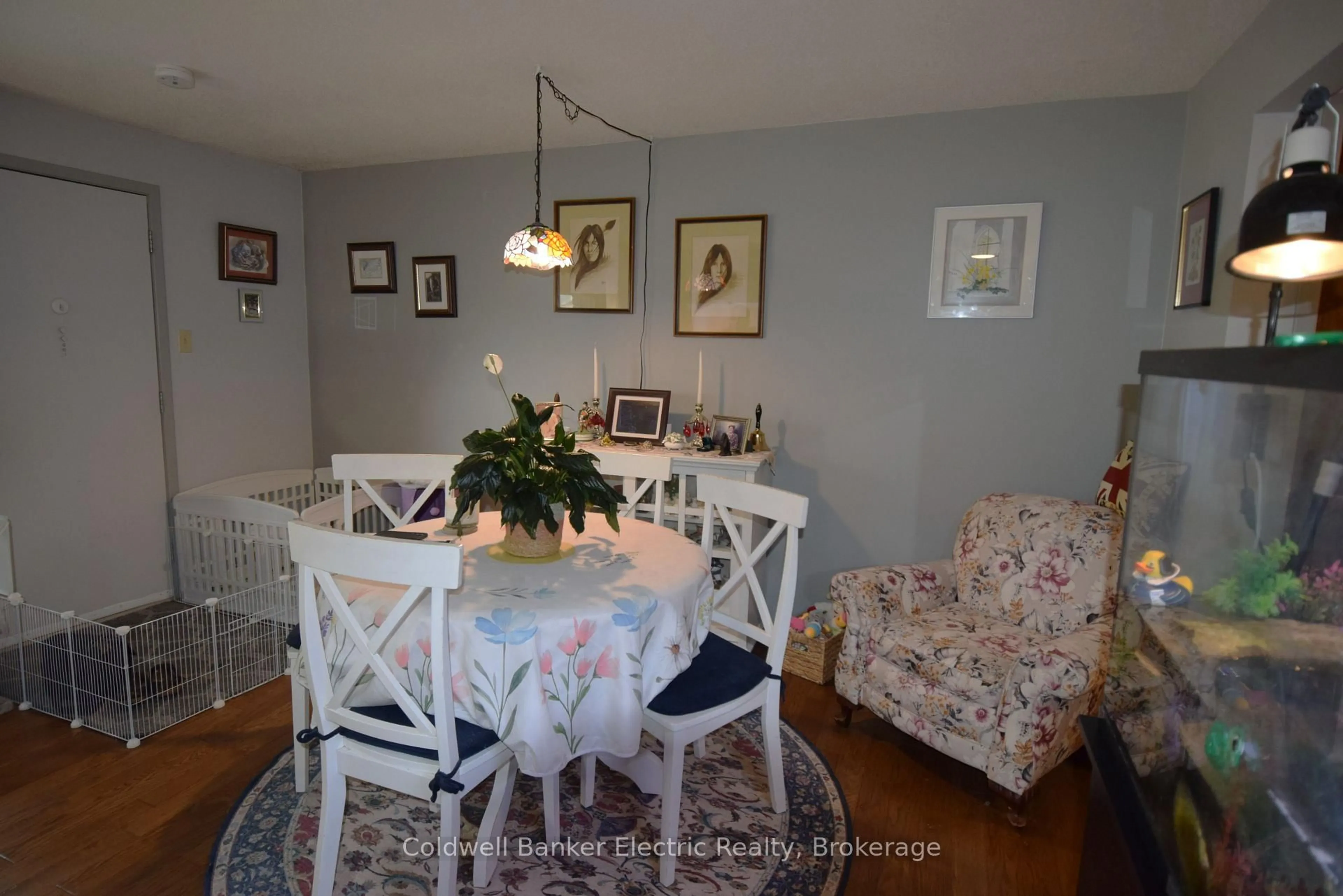 Dining room, wood/laminate floor for 2418 Mountland Dr #104, Peterborough Ontario K9K 2E2
