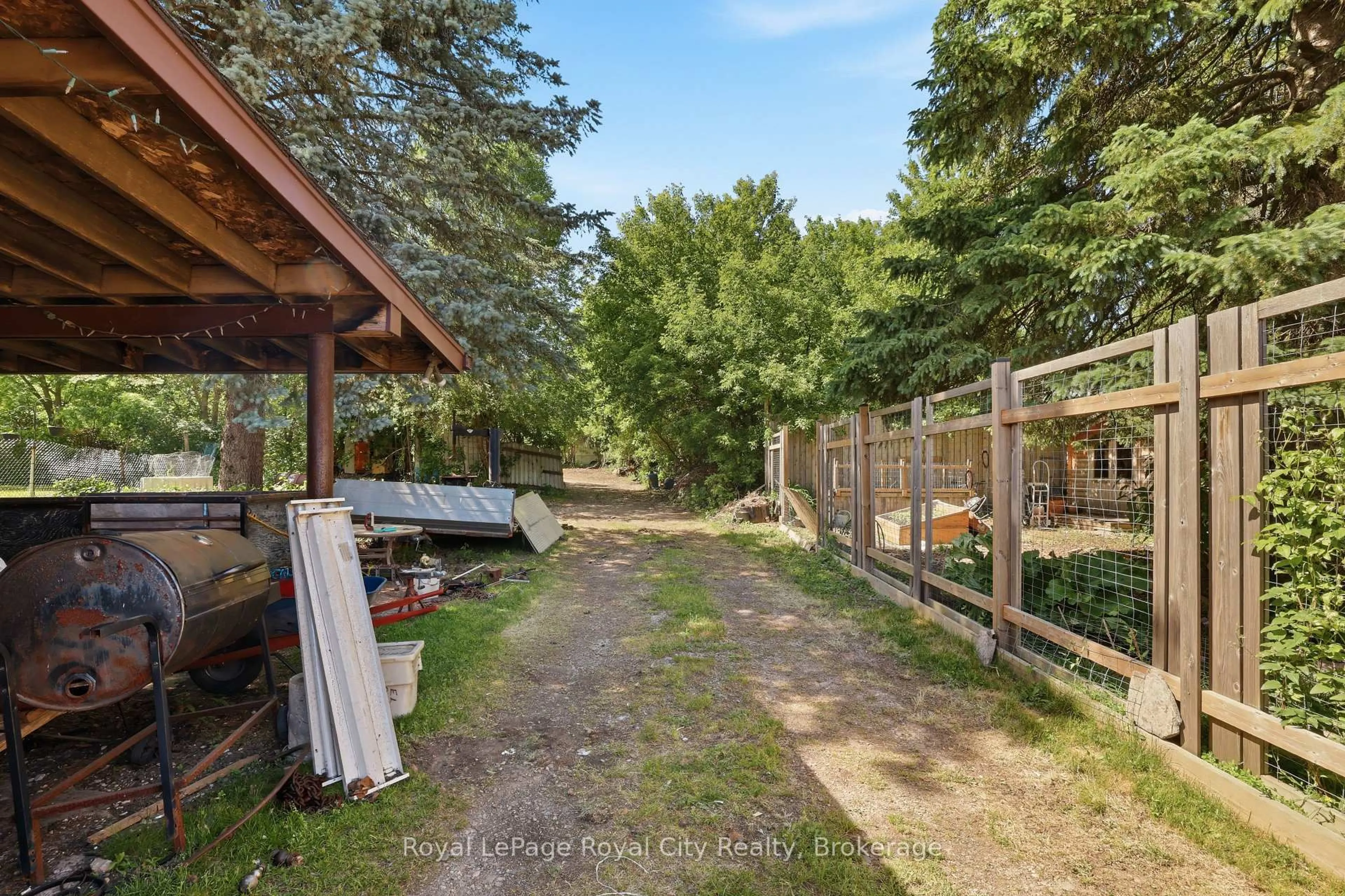 A pic from outside/outdoor area/front of a property/back of a property/a pic from drone, forest/trees view for 96 Beaumont Cres, Guelph Ontario N1E 6B1