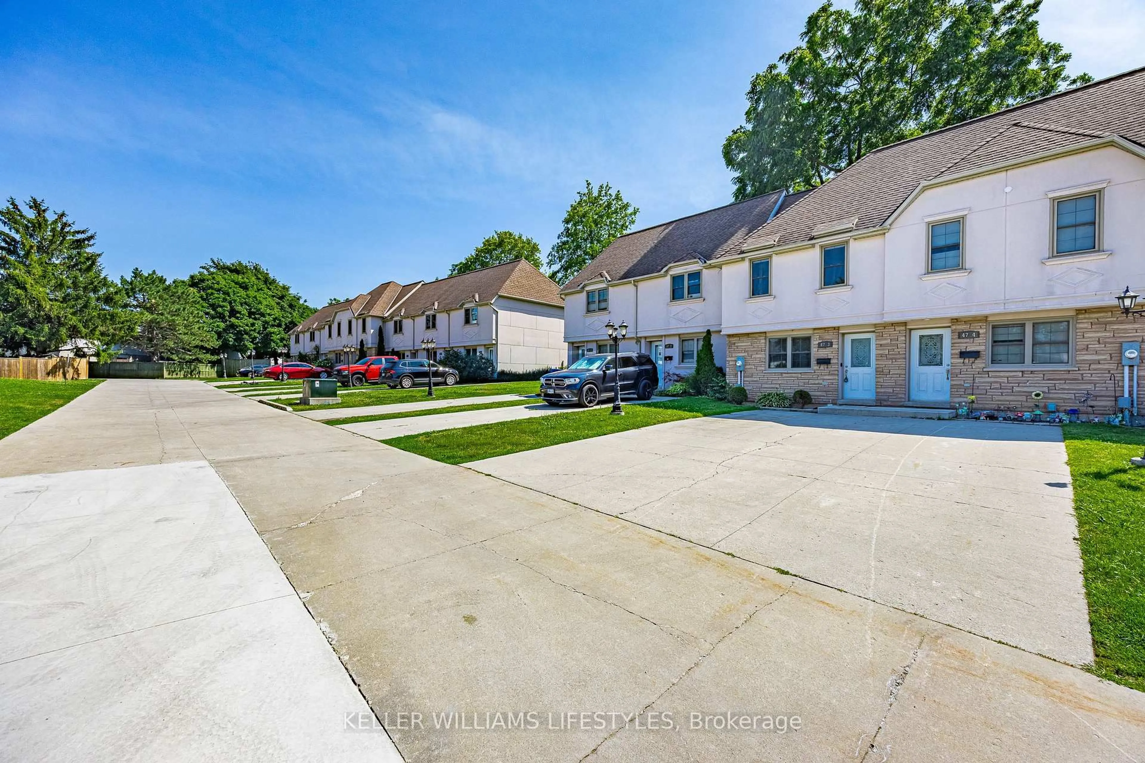 A pic from outside/outdoor area/front of a property/back of a property/a pic from drone, street for 47 Blandford St #3, Woodstock Ontario N4S 7H7
