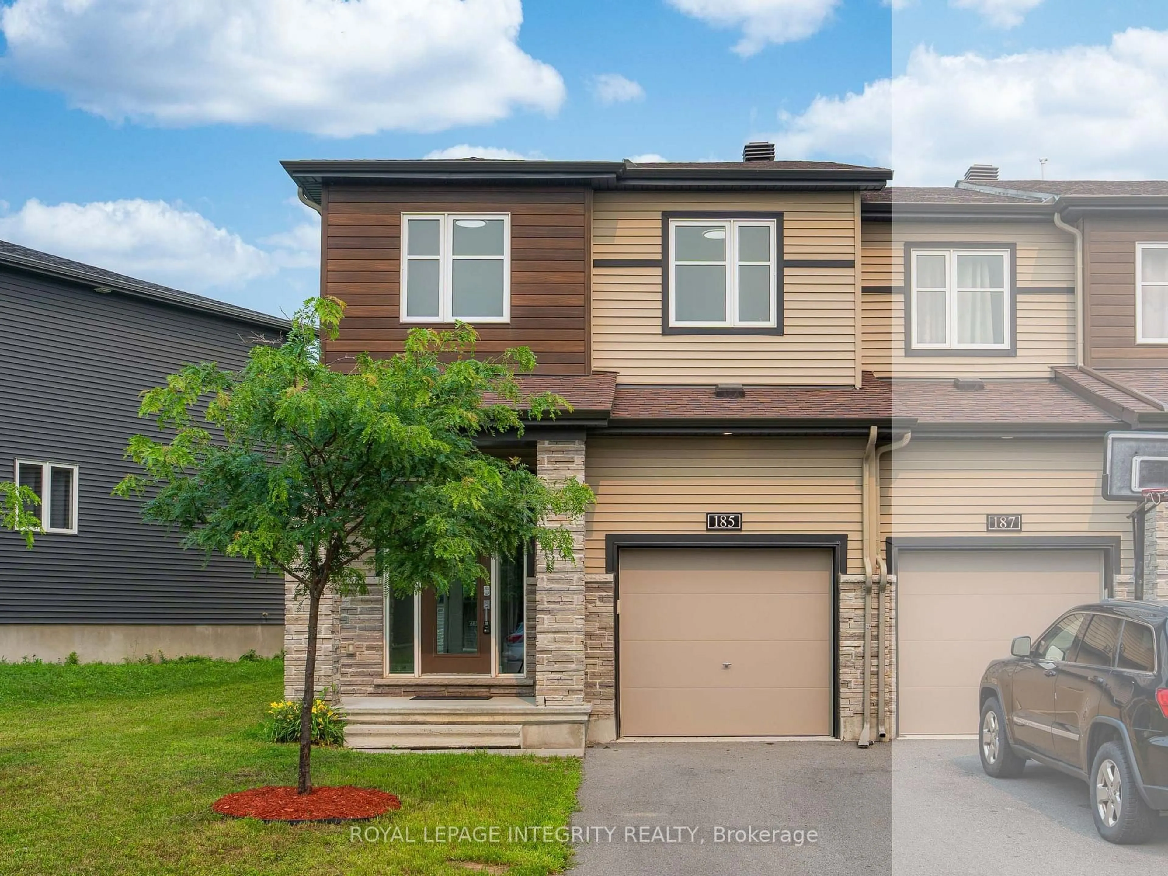 Home with brick exterior material, street for 185 Bending Way, Ottawa Ontario K2J 6P2