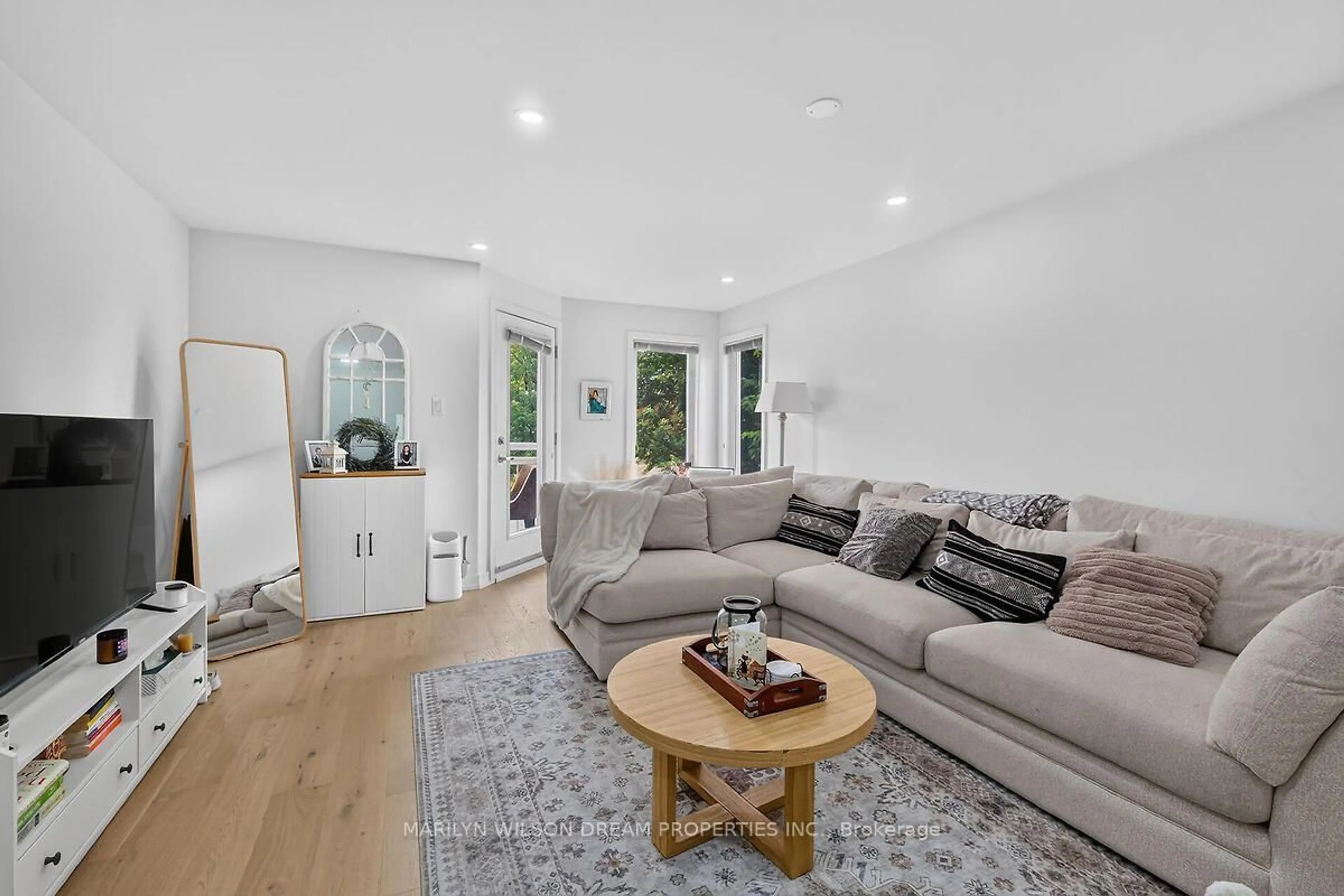 Living room with furniture, unknown for 4522 Innes Rd #D, Ottawa Ontario K4A 0X5
