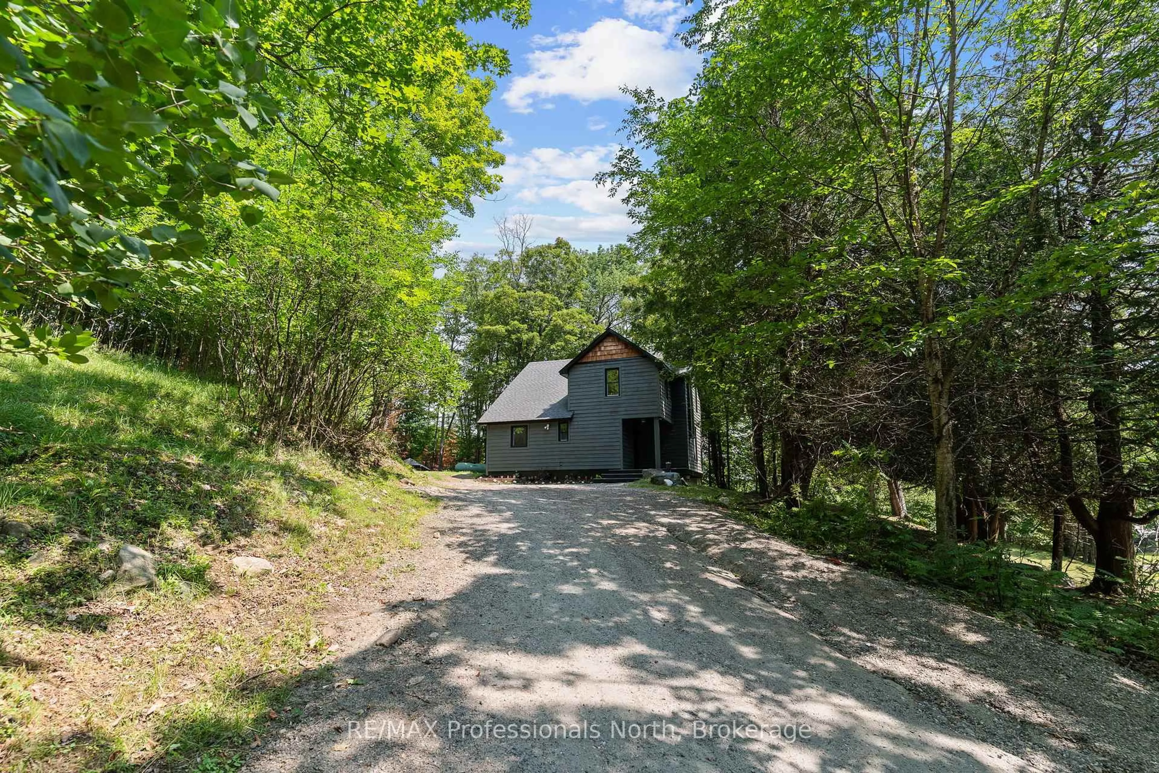 A pic from outside/outdoor area/front of a property/back of a property/a pic from drone, unknown for 501 Mountain St, Dysart et al Ontario K0M 1S0