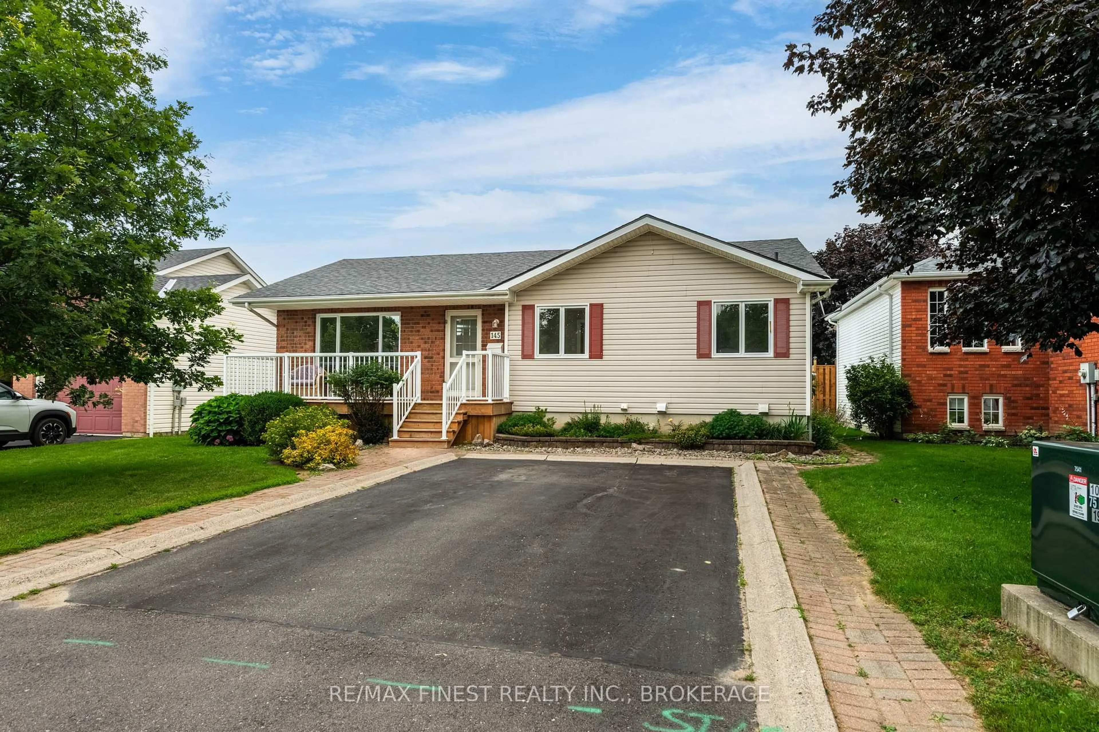 Home with vinyl exterior material, street for 145 Elmwood Dr, Gananoque Ontario K7G 1P2