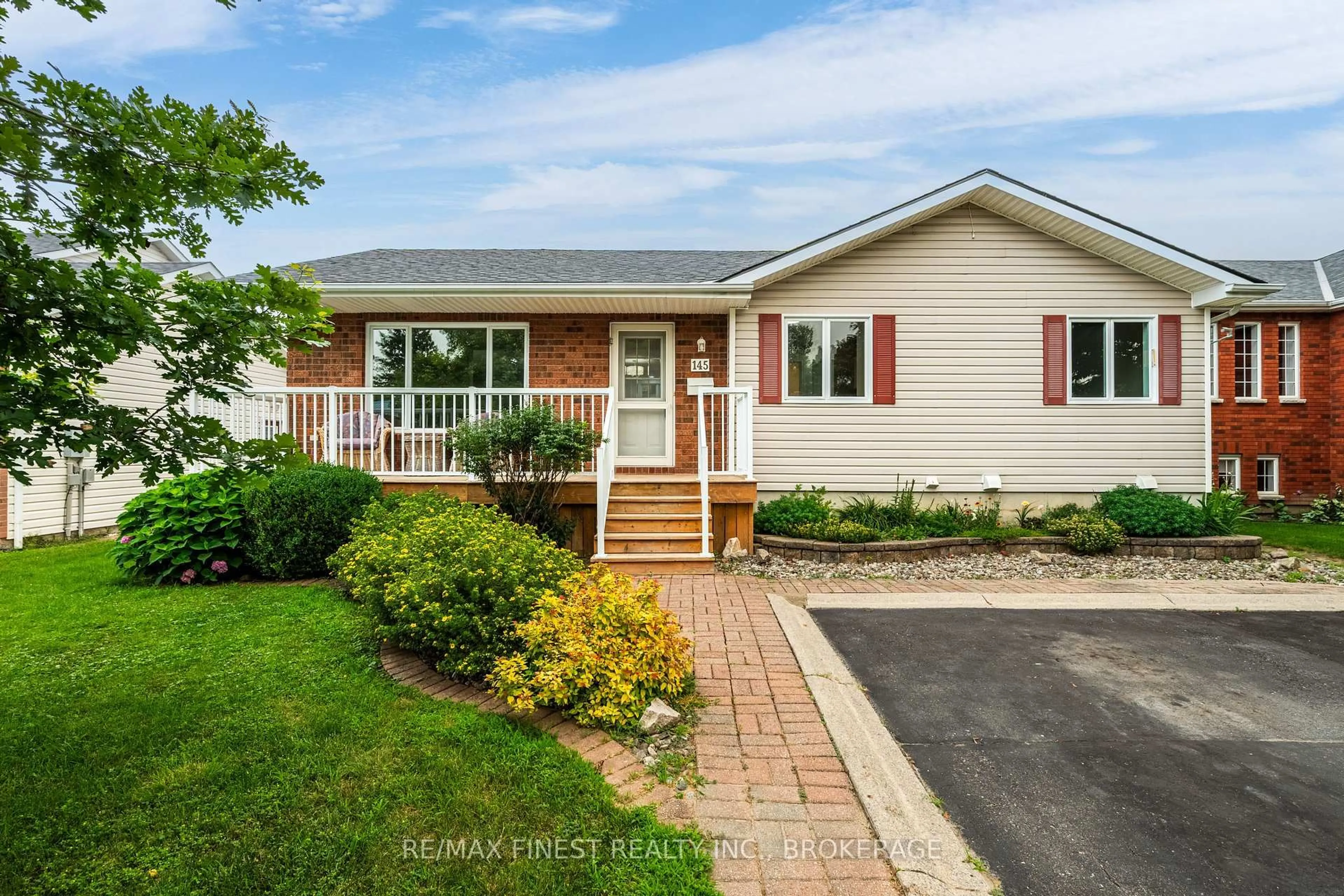 Home with brick exterior material, street for 145 Elmwood Dr, Gananoque Ontario K7G 1P2