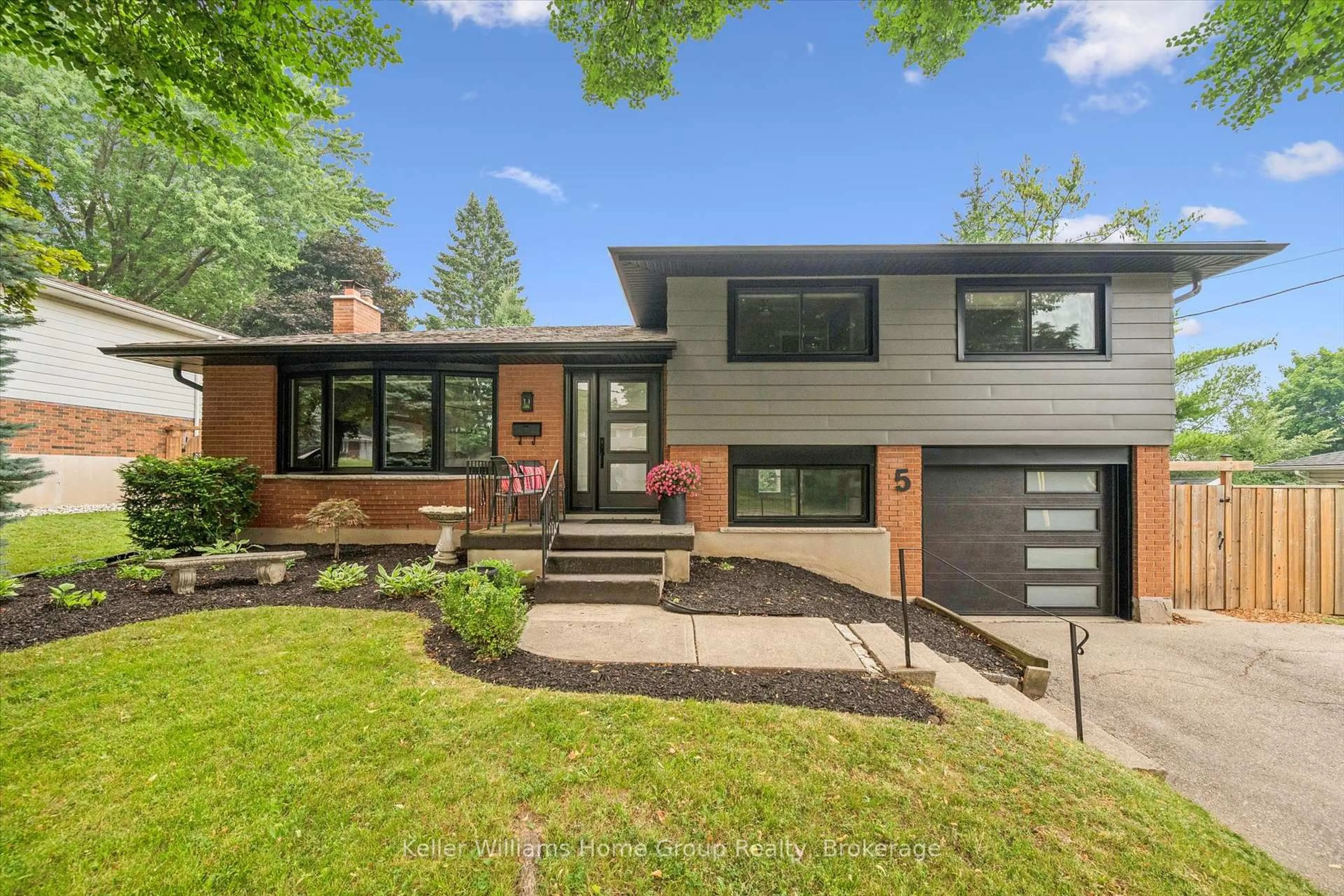 Home with brick exterior material, street for 5 Cheltonwood Ave, Guelph Ontario N1E 4E1