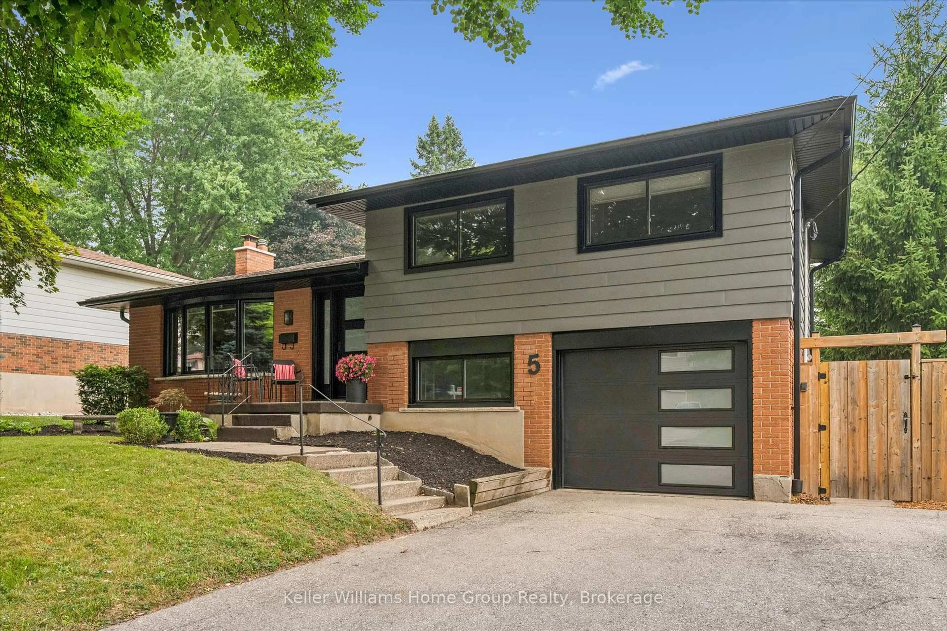Home with brick exterior material, street for 5 Cheltonwood Ave, Guelph Ontario N1E 4E1
