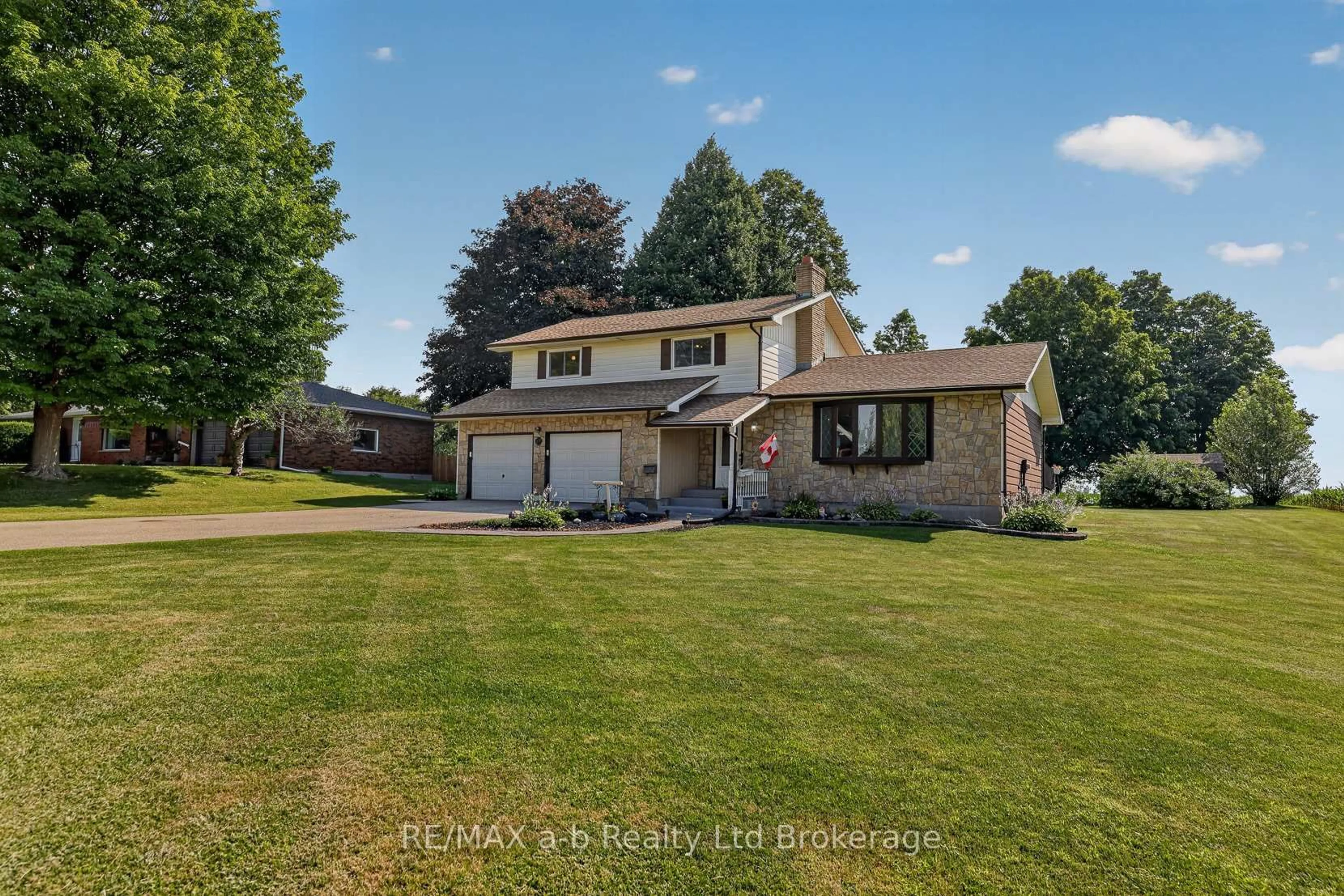 A pic from outside/outdoor area/front of a property/back of a property/a pic from drone, water/lake/river/ocean view for 23 Burgess St, Norwich Ontario N0J 1C0