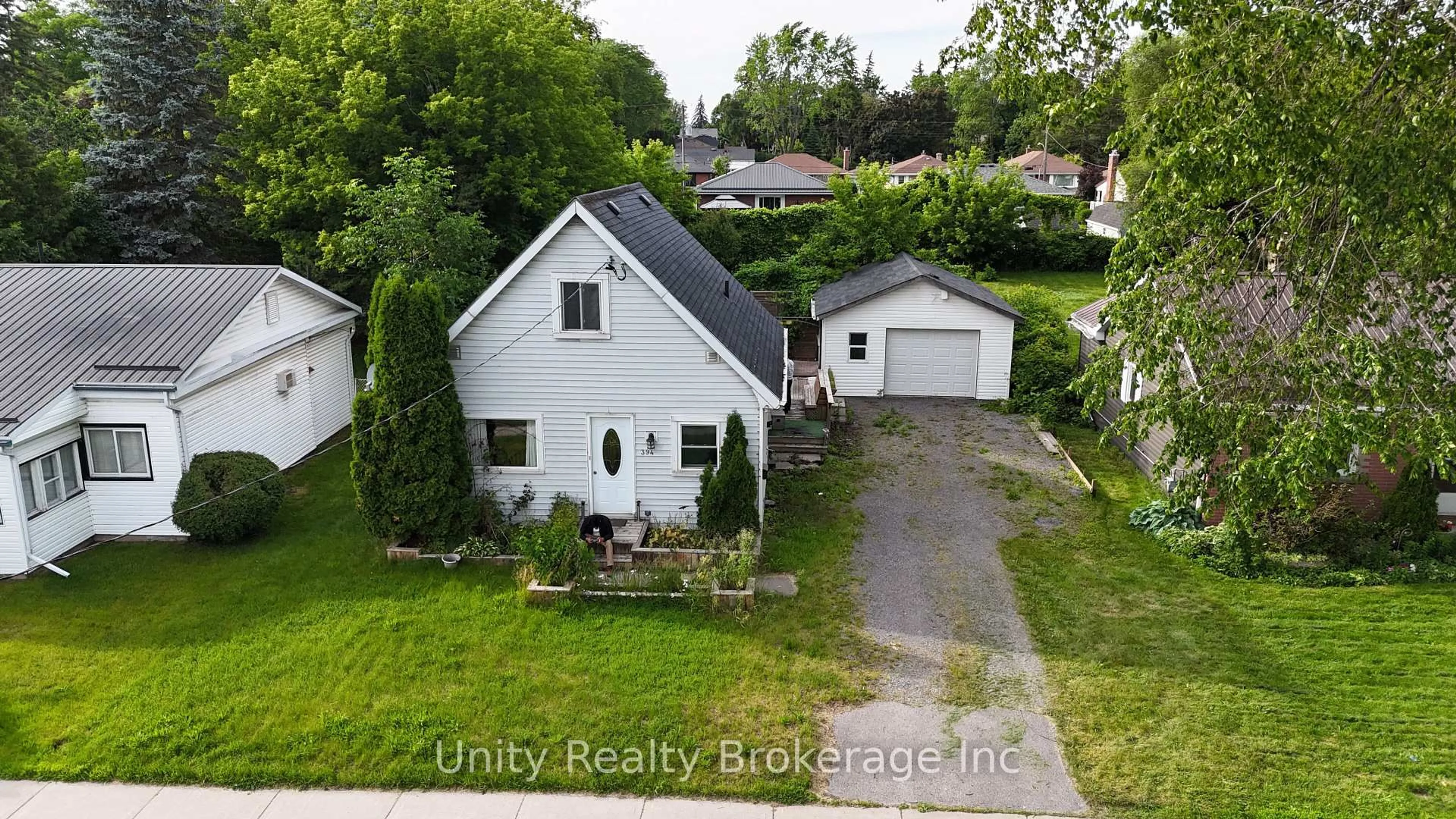 A pic from outside/outdoor area/front of a property/back of a property/a pic from drone, street for 394 Bridge St, Belleville Ontario K8N 1P8