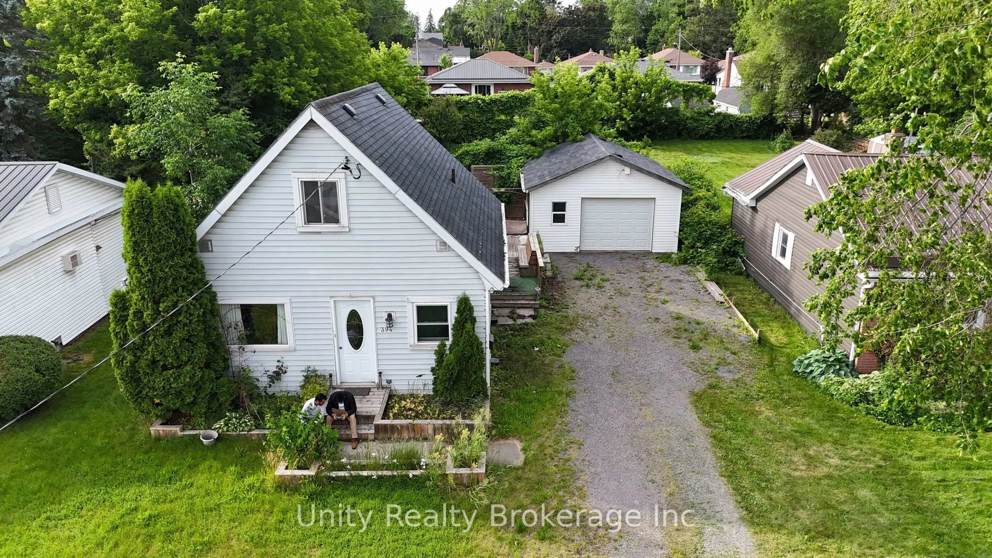 A pic from outside/outdoor area/front of a property/back of a property/a pic from drone, street for 394 Bridge St, Belleville Ontario K8N 1P8
