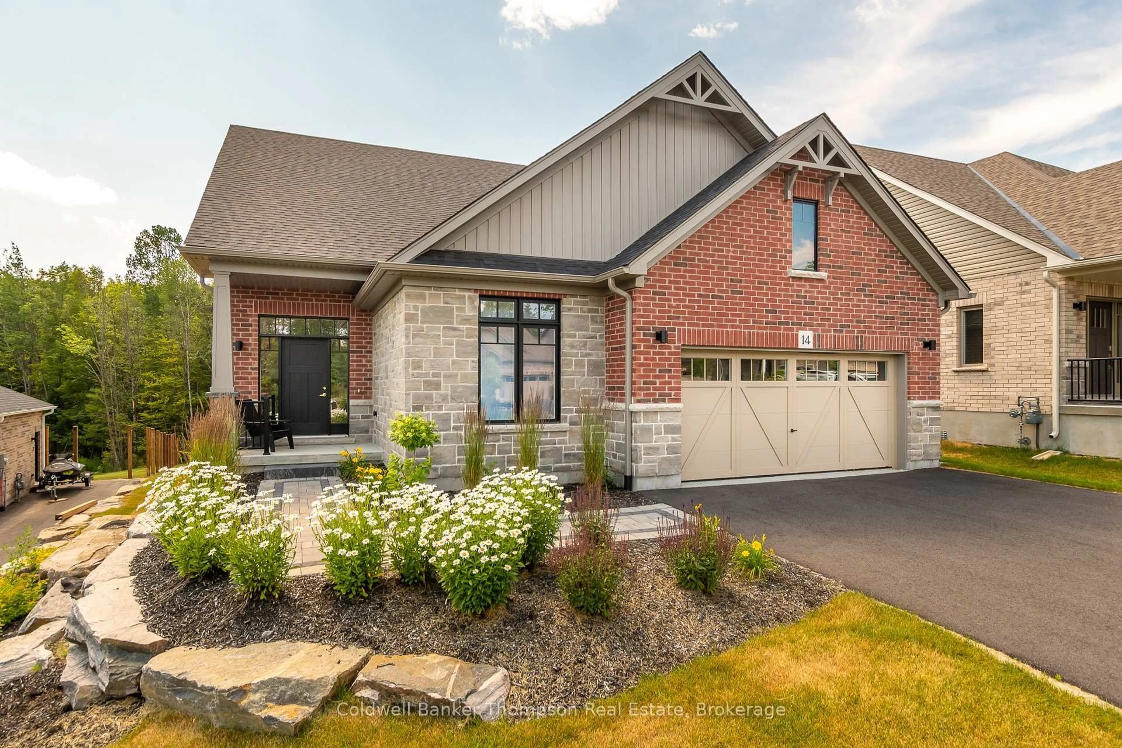 Home with brick exterior material, street for 14 Eaglecrest Ave, Huntsville Ontario P1H 0G5