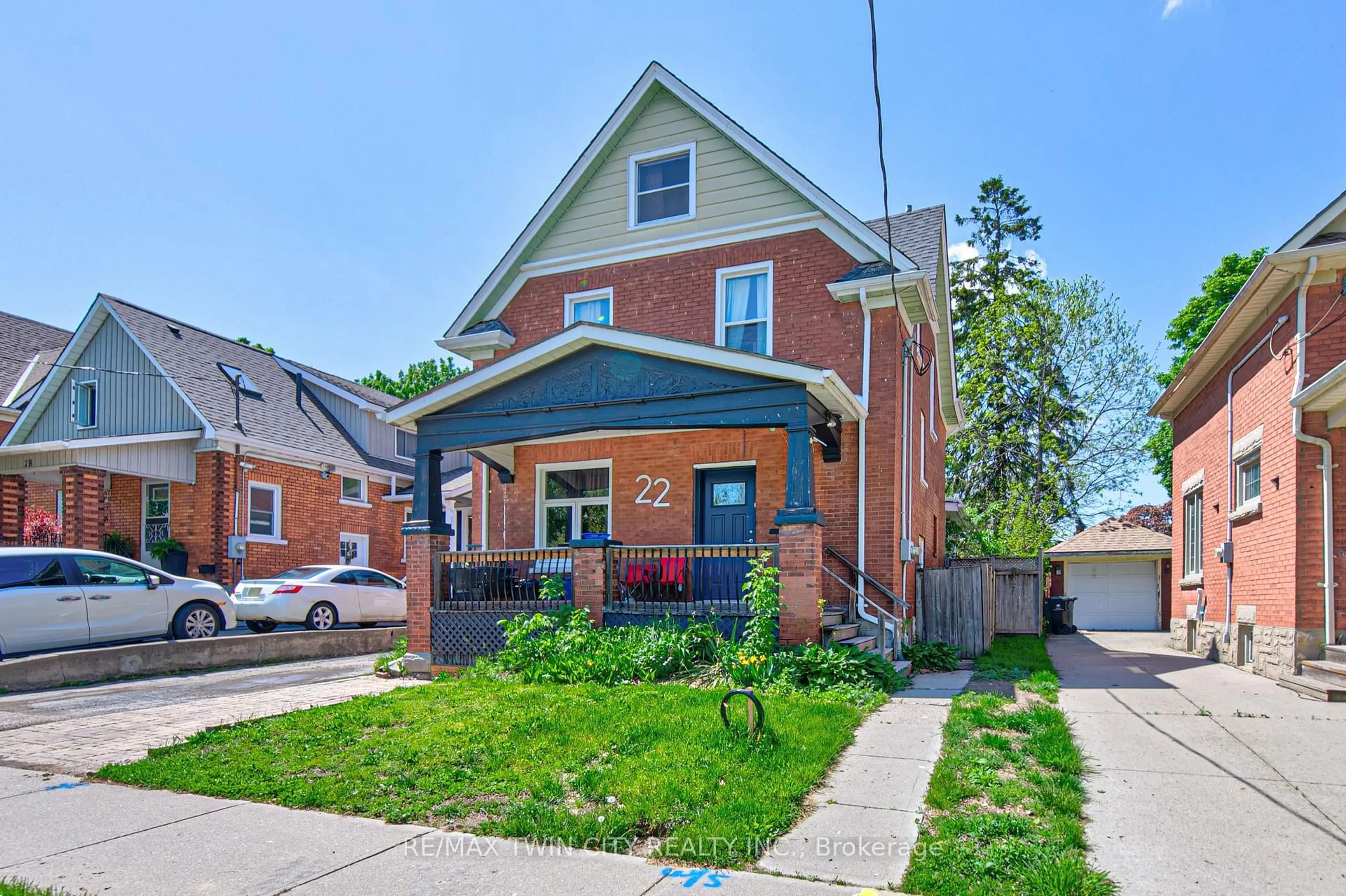 Home with brick exterior material, street for 22 Herlan Ave, Kitchener Ontario N2G 4K3
