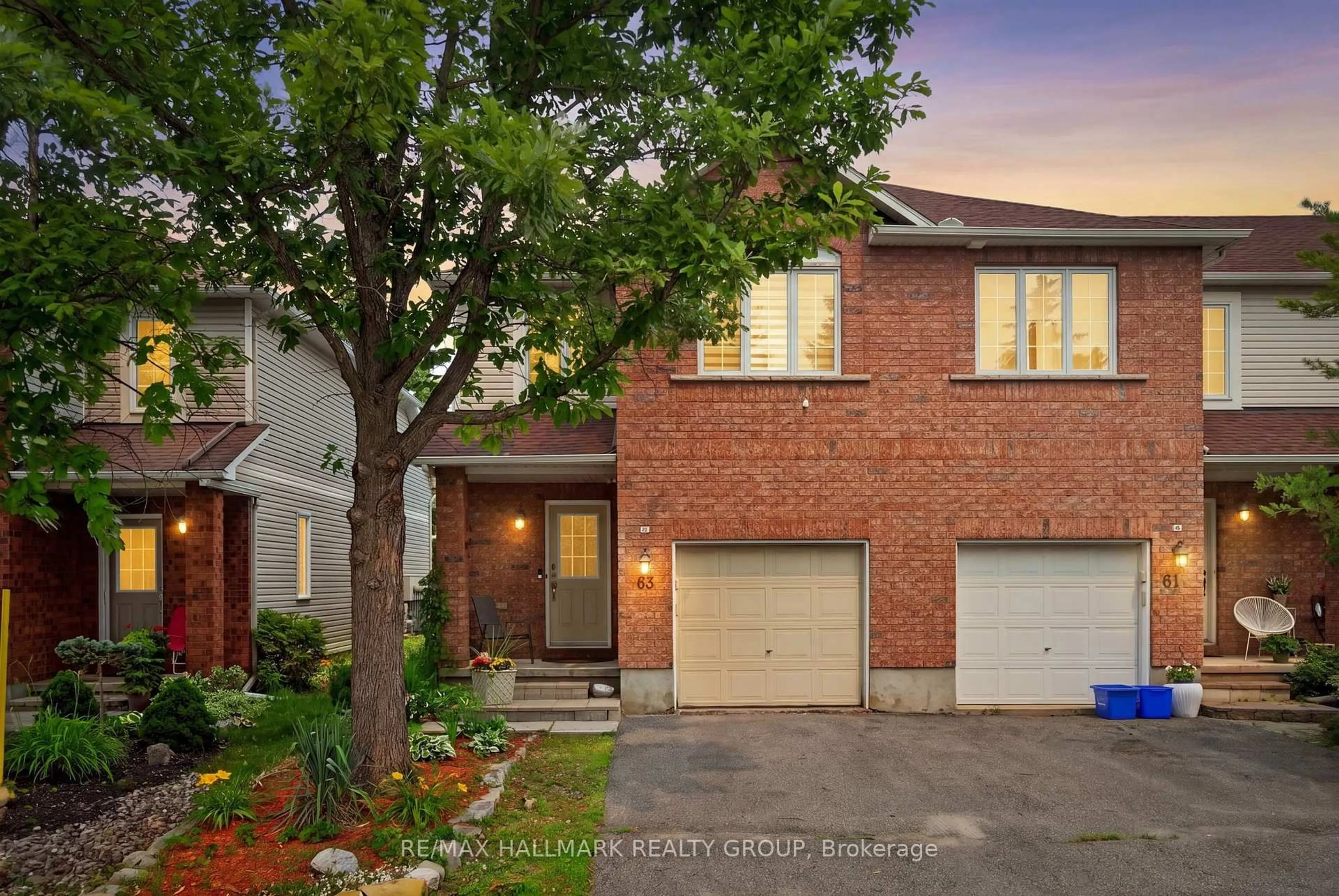 Home with brick exterior material, street for 63 Palmadeo Dr, Ottawa Ontario K2J 4Z3