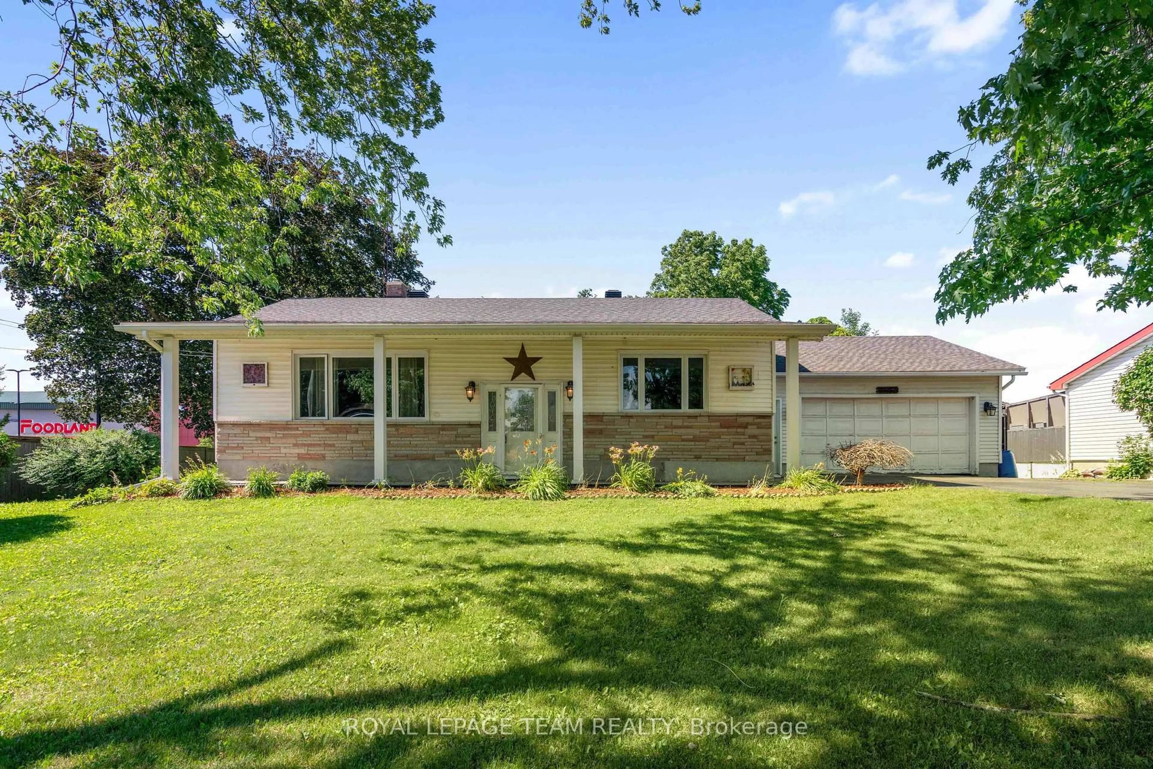 Home with vinyl exterior material, street for 12029 Main St, North Dundas Ontario K0C 2K0