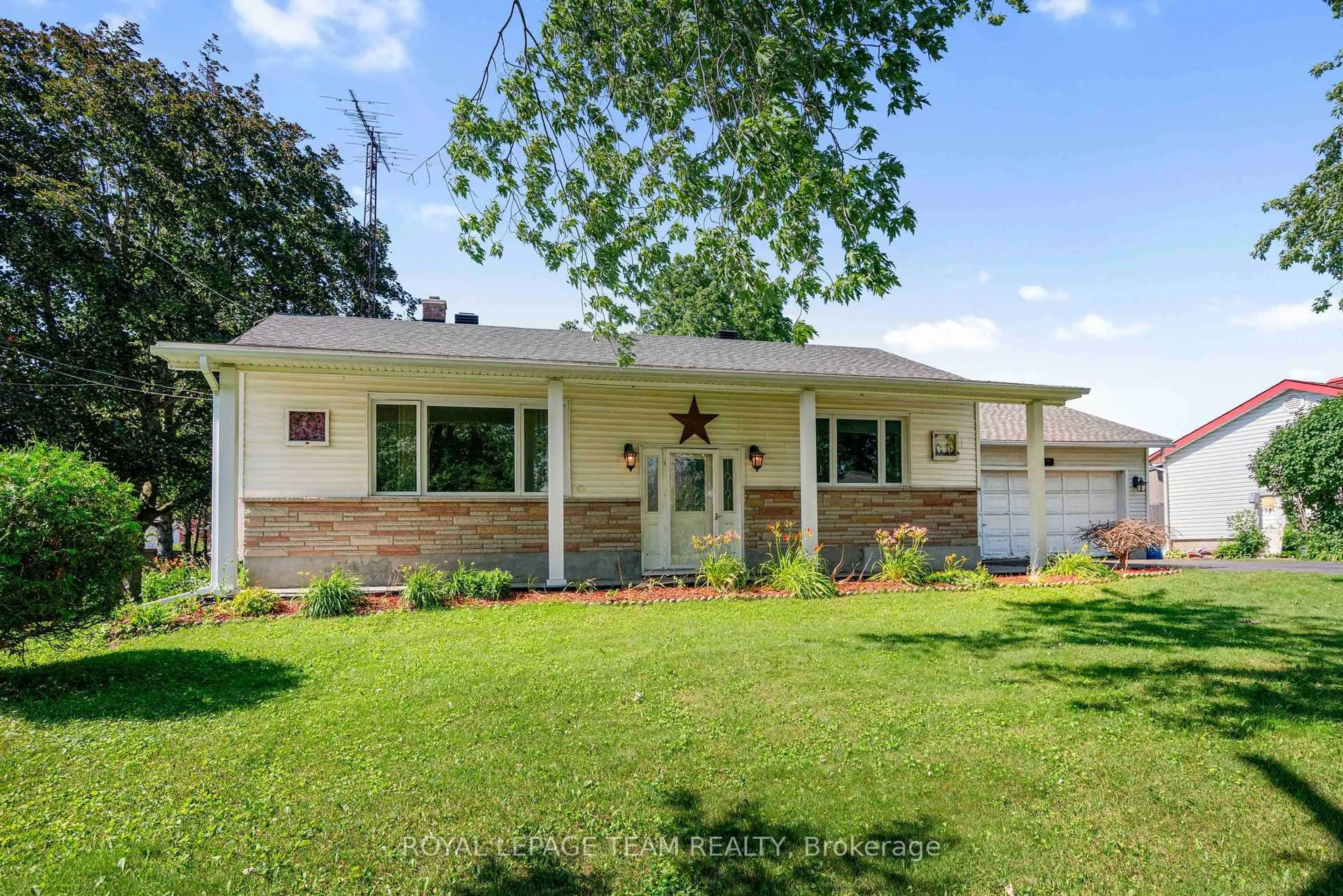Home with vinyl exterior material, street for 12029 Main St, North Dundas Ontario K0C 2K0