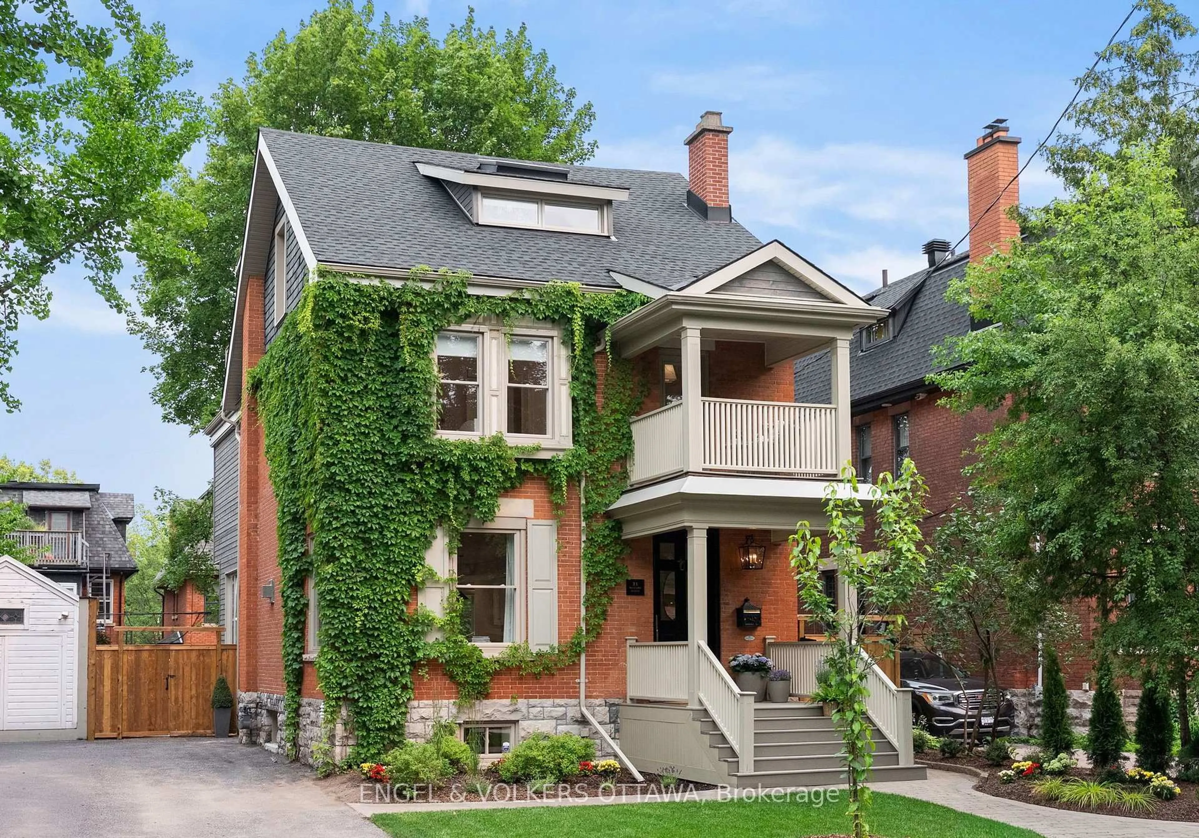 Home with brick exterior material, street for 31 Woodlawn Ave, Ottawa Ontario K1S 2S8