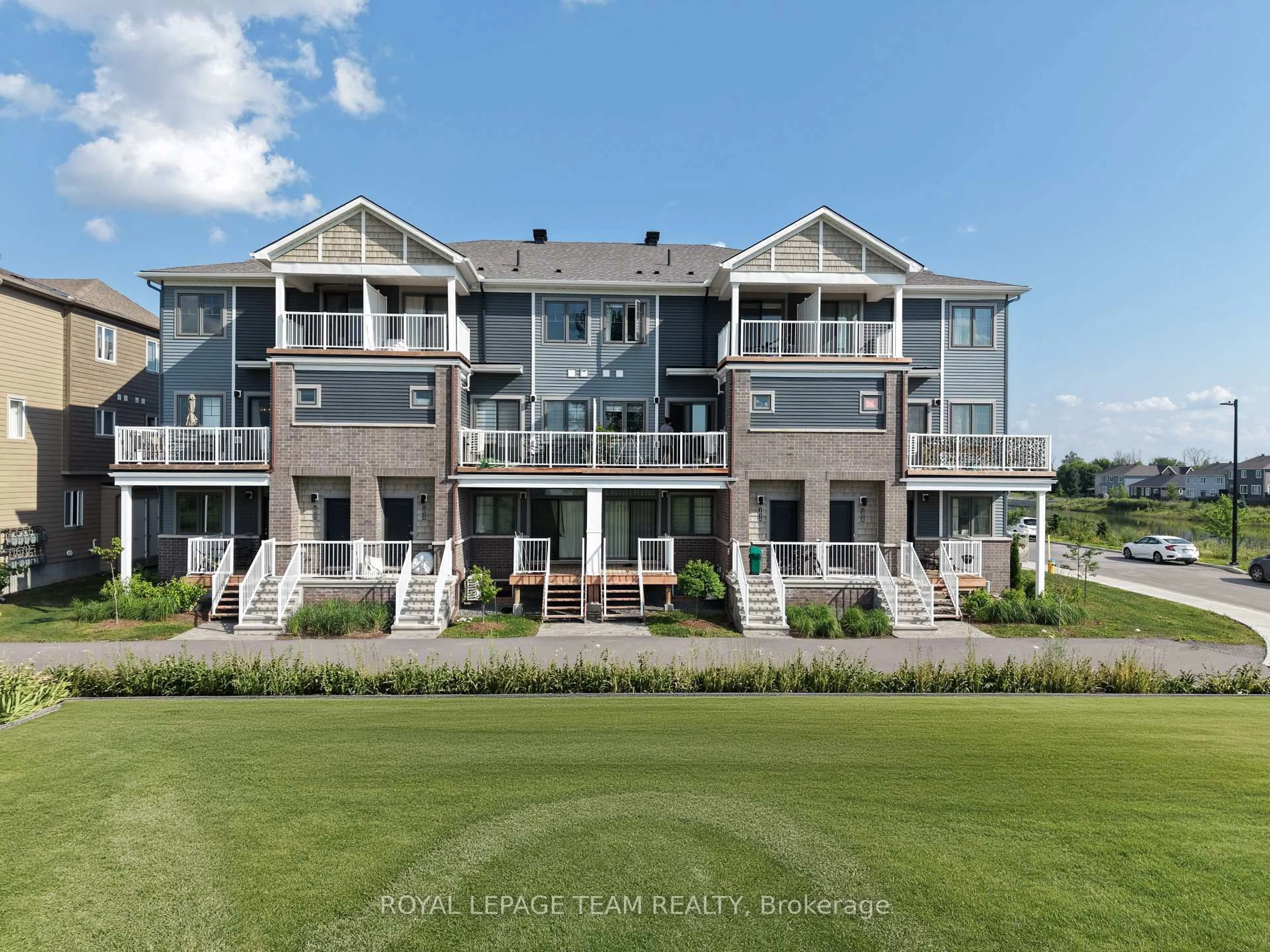 A pic from outside/outdoor area/front of a property/back of a property/a pic from drone, water/lake/river/ocean view for 1022 Chapman Mills Dr, Ottawa Ontario K2J 7J2