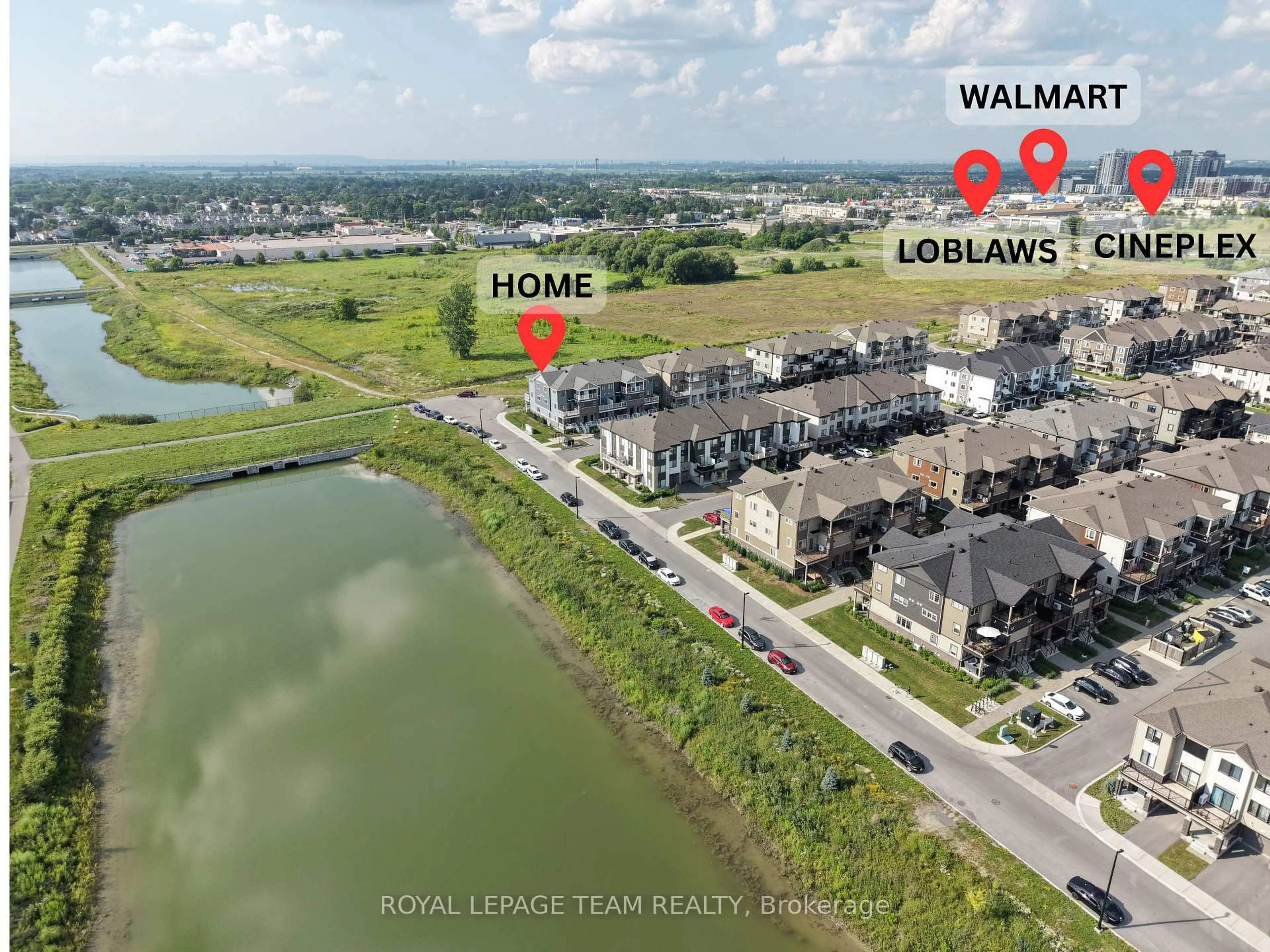 A pic from outside/outdoor area/front of a property/back of a property/a pic from drone, water/lake/river/ocean view for 1022 Chapman Mills Dr, Ottawa Ontario K2J 7J2
