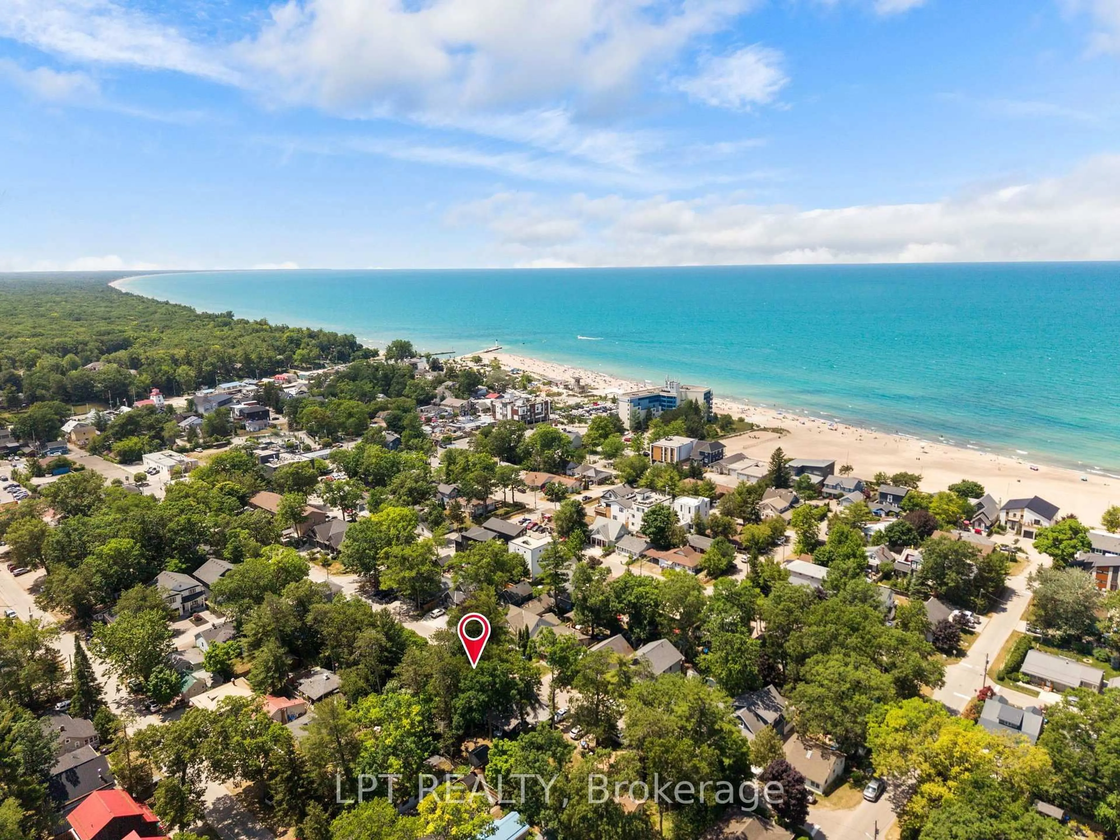 A pic from outside/outdoor area/front of a property/back of a property/a pic from drone, water/lake/river/ocean view for 30 Woodward Ave, Lambton Shores Ontario N0M 1T0