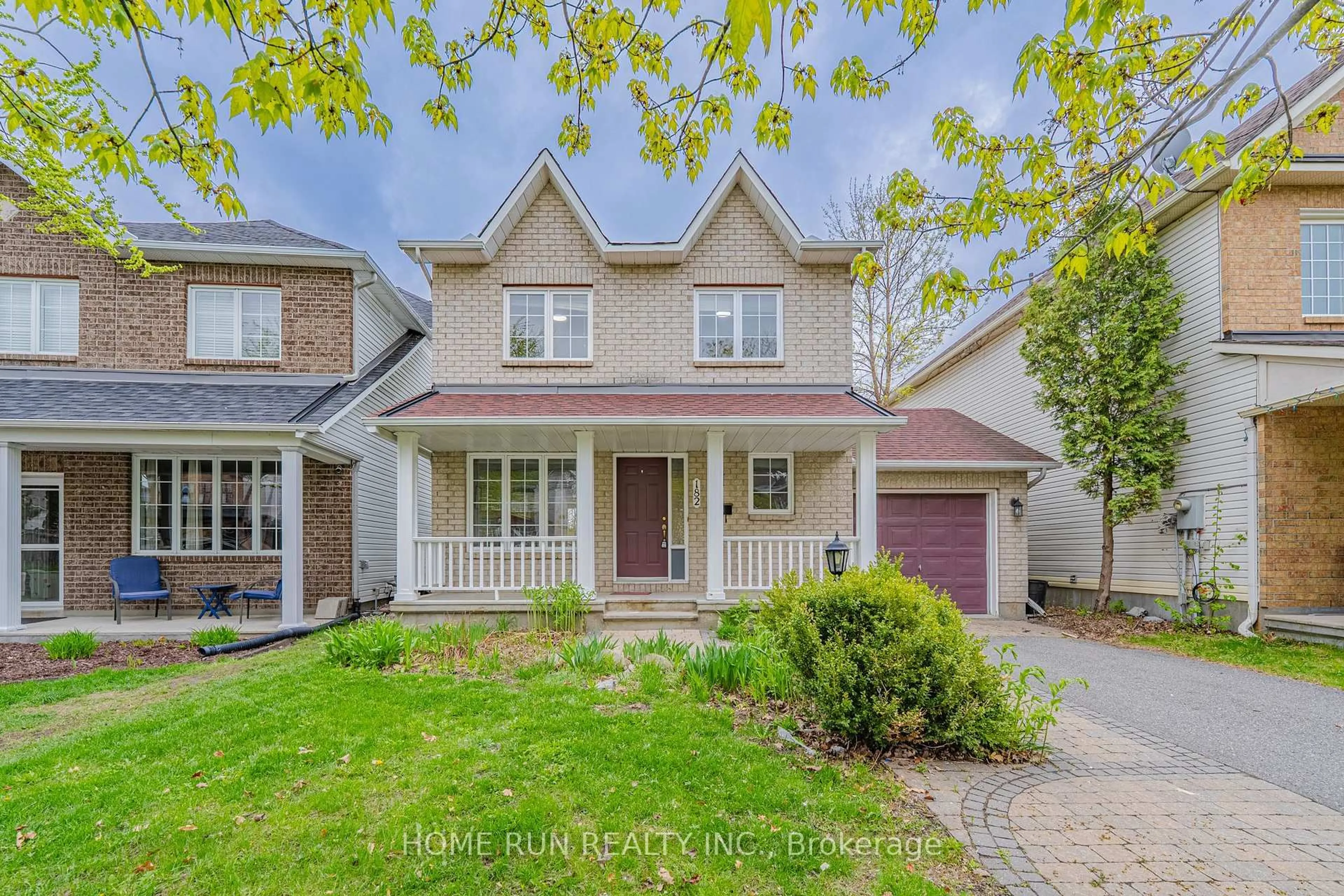 Home with brick exterior material, street for 182 Windhurst Dr, Ottawa Ontario K2G 6J4