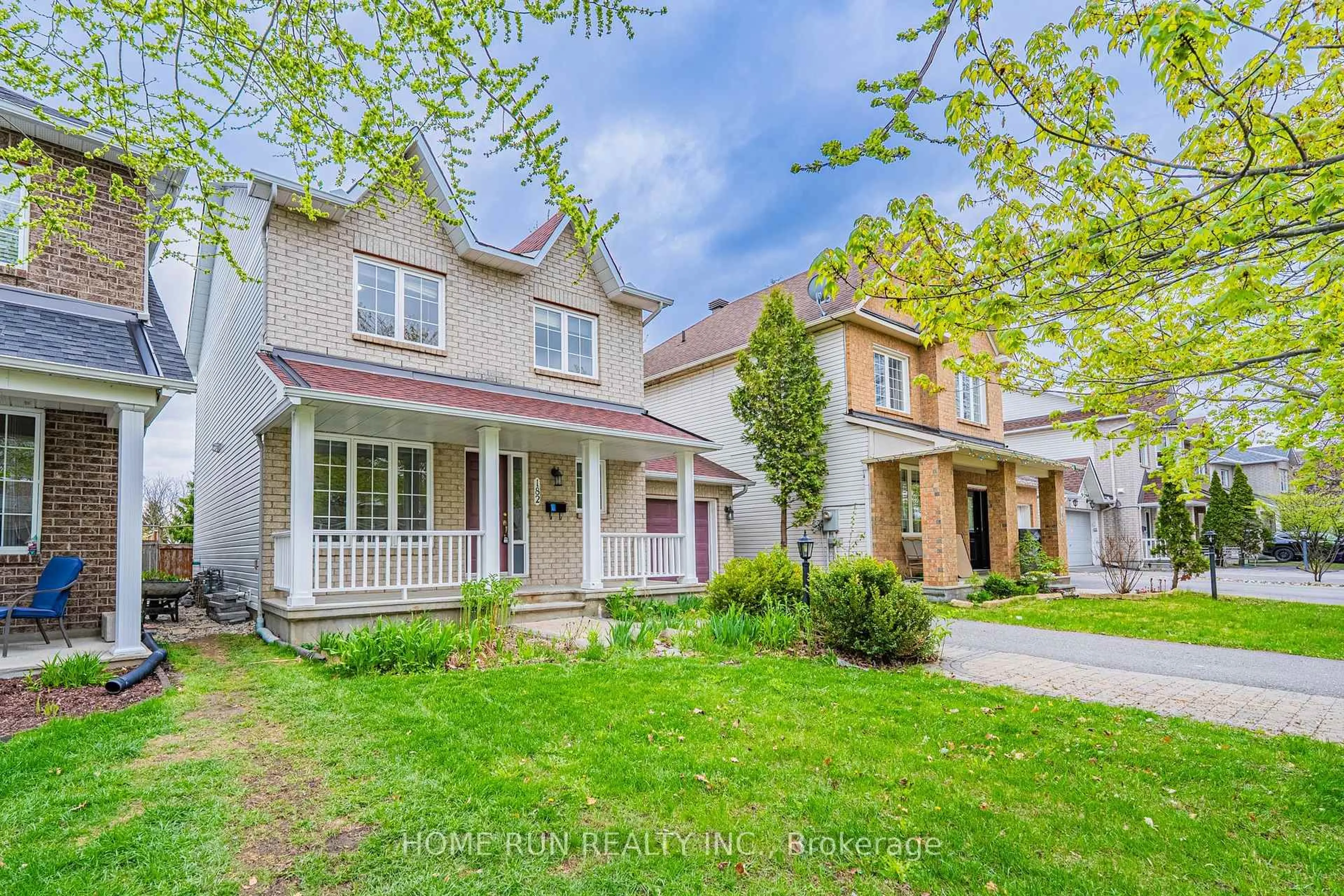 Home with brick exterior material, street for 182 Windhurst Dr, Ottawa Ontario K2G 6J4