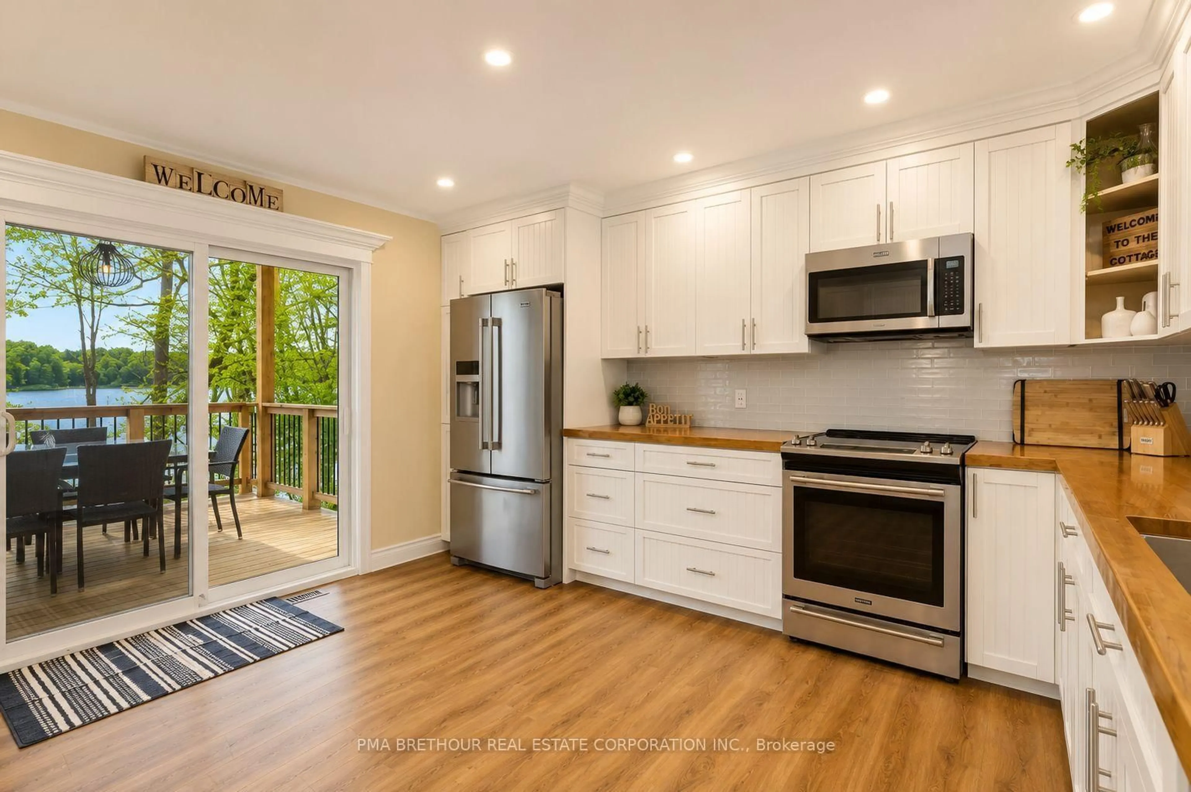 Open concept kitchen, wood/laminate floor for 56 Long Lake Estates Rd, McDougall Ontario P2A 2W7