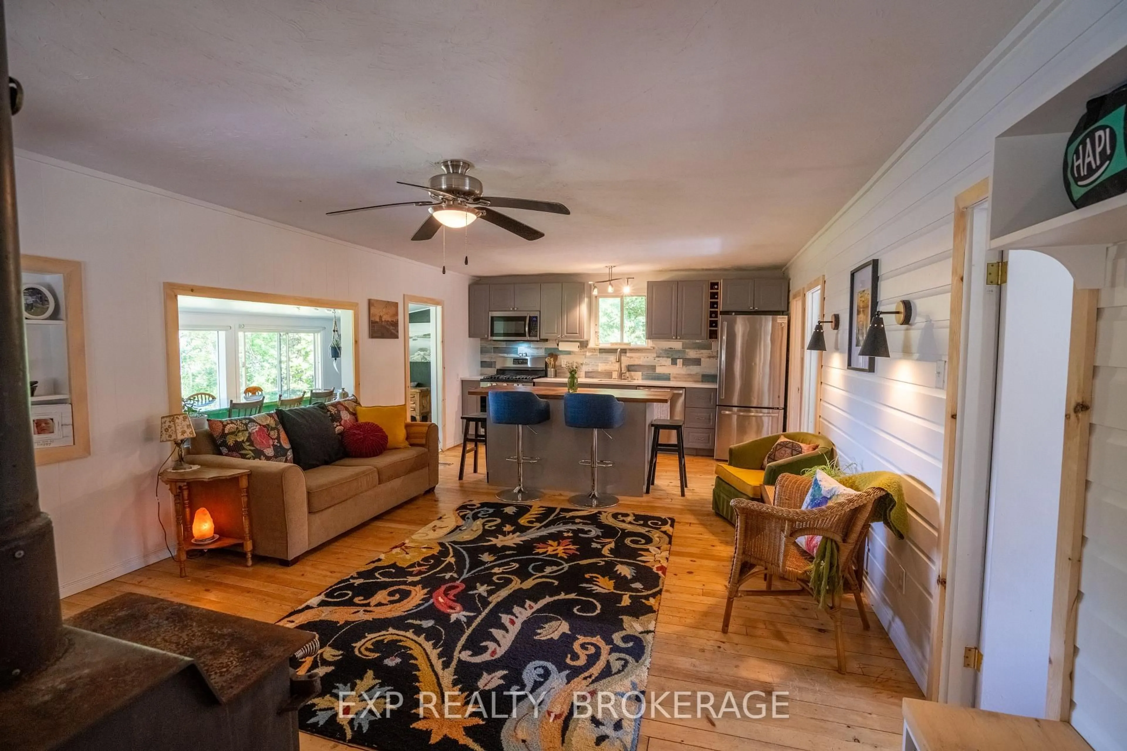 Open concept kitchen, wood/laminate floor for 1026 Arcol Rd, Ompah Ontario K0H 2J0