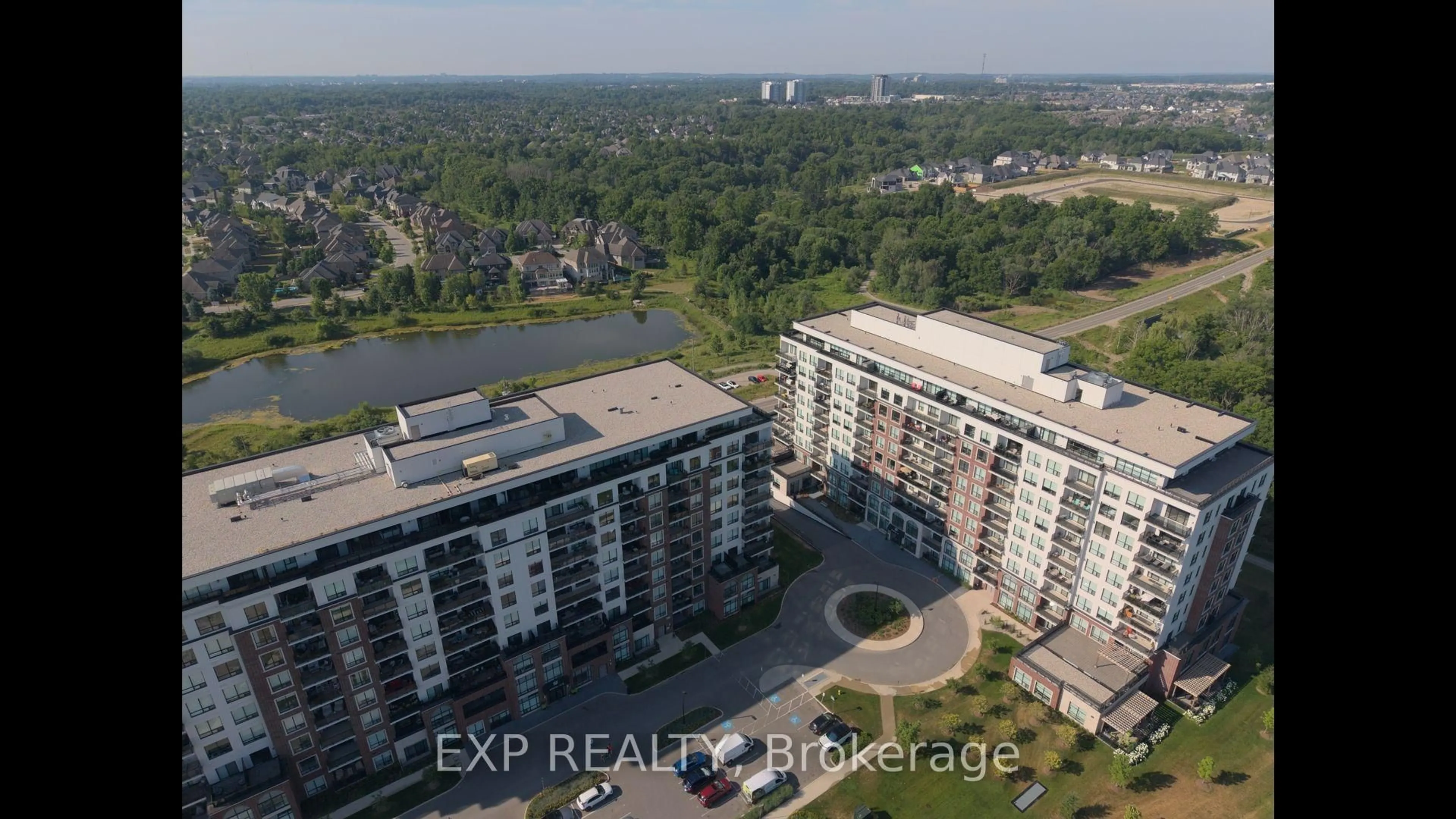 A pic from outside/outdoor area/front of a property/back of a property/a pic from drone, city buildings view from balcony for 460 Callaway Rd #508, London North Ontario N6G 0Z2