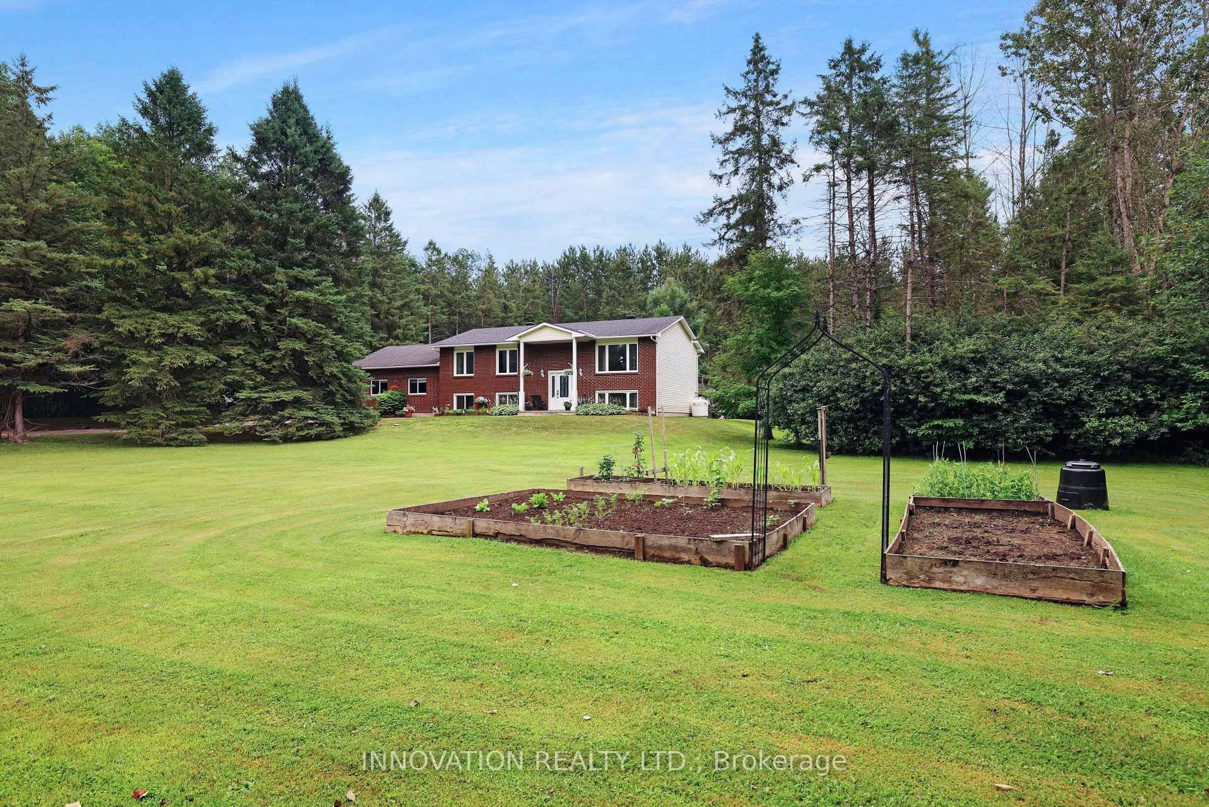 A pic from outside/outdoor area/front of a property/back of a property/a pic from drone, forest/trees view for 2820 Tompkins Rd, North Grenville Ontario K0G 1J0