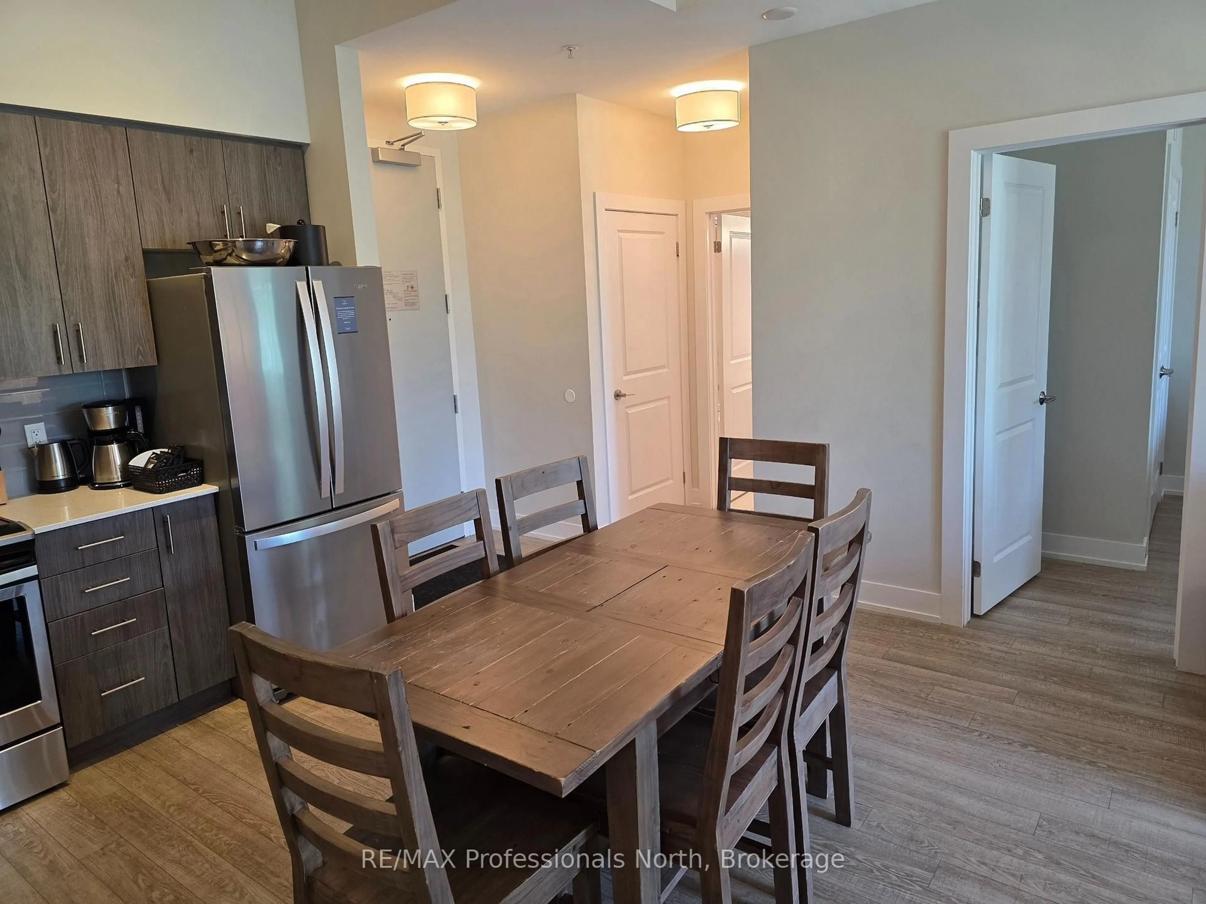 Dining room, wood/laminate floor for 25 Penn Lake Point Rd #017, Huntsville Ontario P1H 1A9