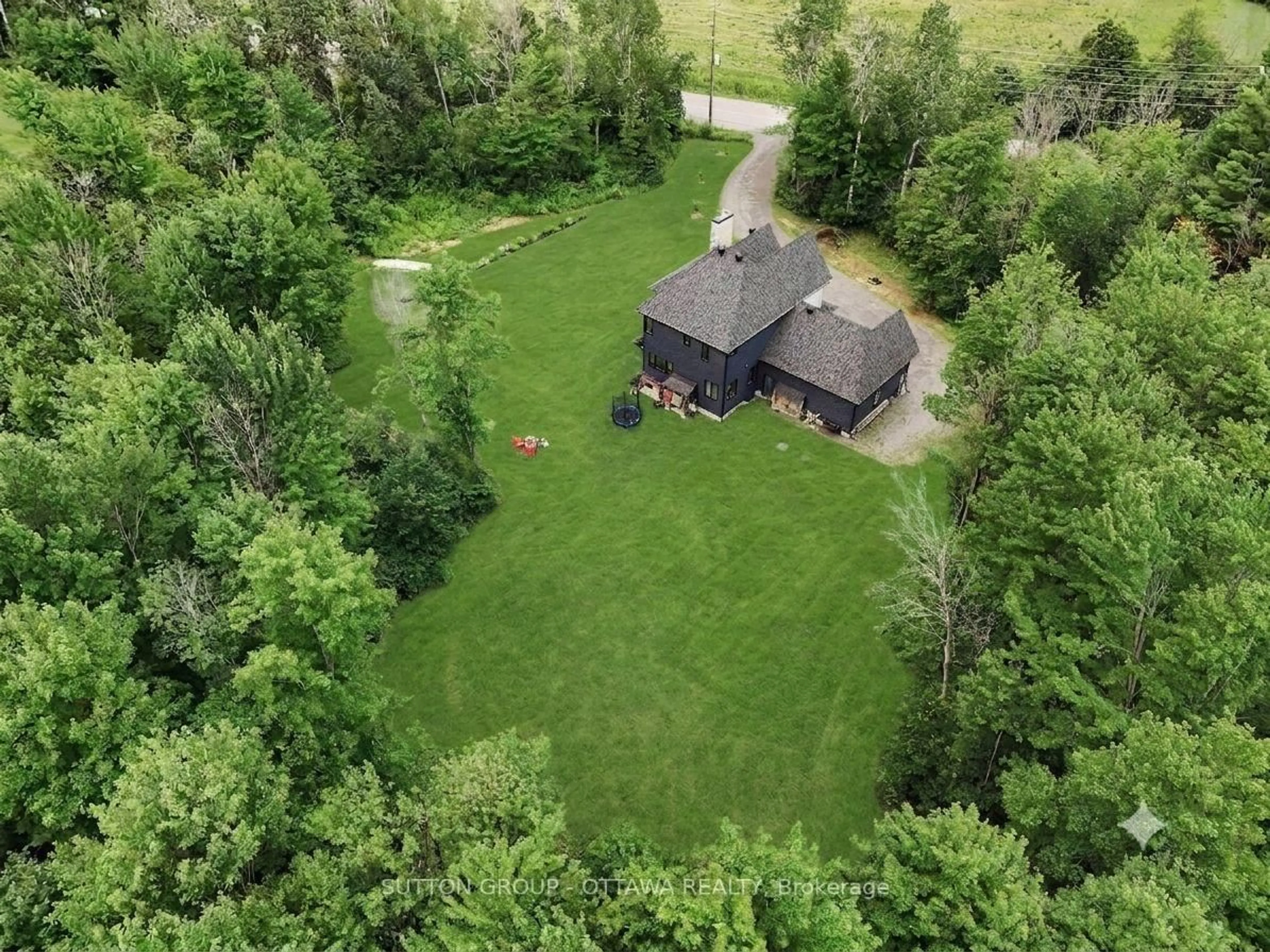 A pic from outside/outdoor area/front of a property/back of a property/a pic from drone, forest/trees view for 4675 Farmers Way, Carlsbad Springs Ontario K0A 1K0