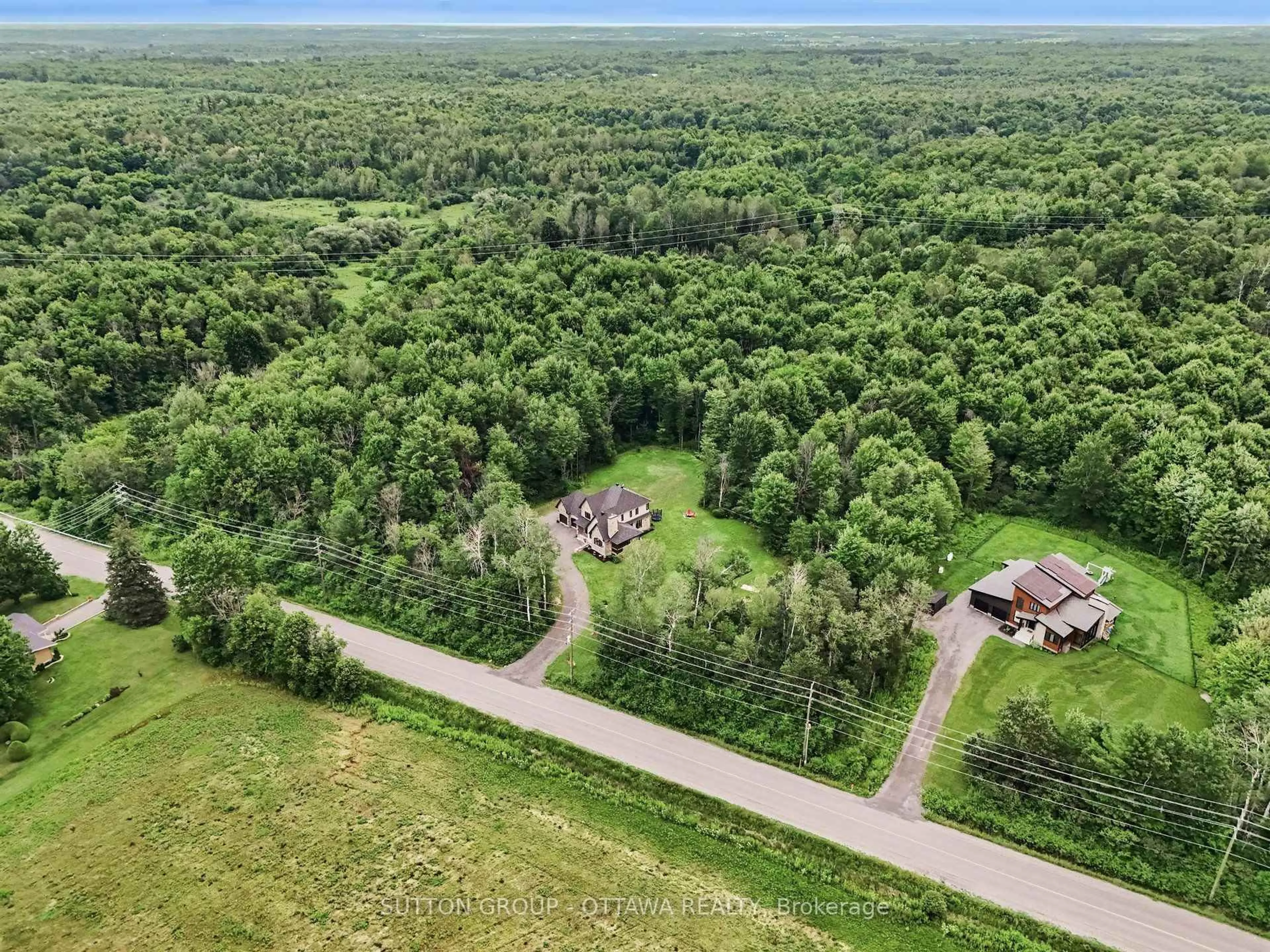 A pic from outside/outdoor area/front of a property/back of a property/a pic from drone, forest/trees view for 4675 Farmers Way, Carlsbad Springs Ontario K0A 1K0