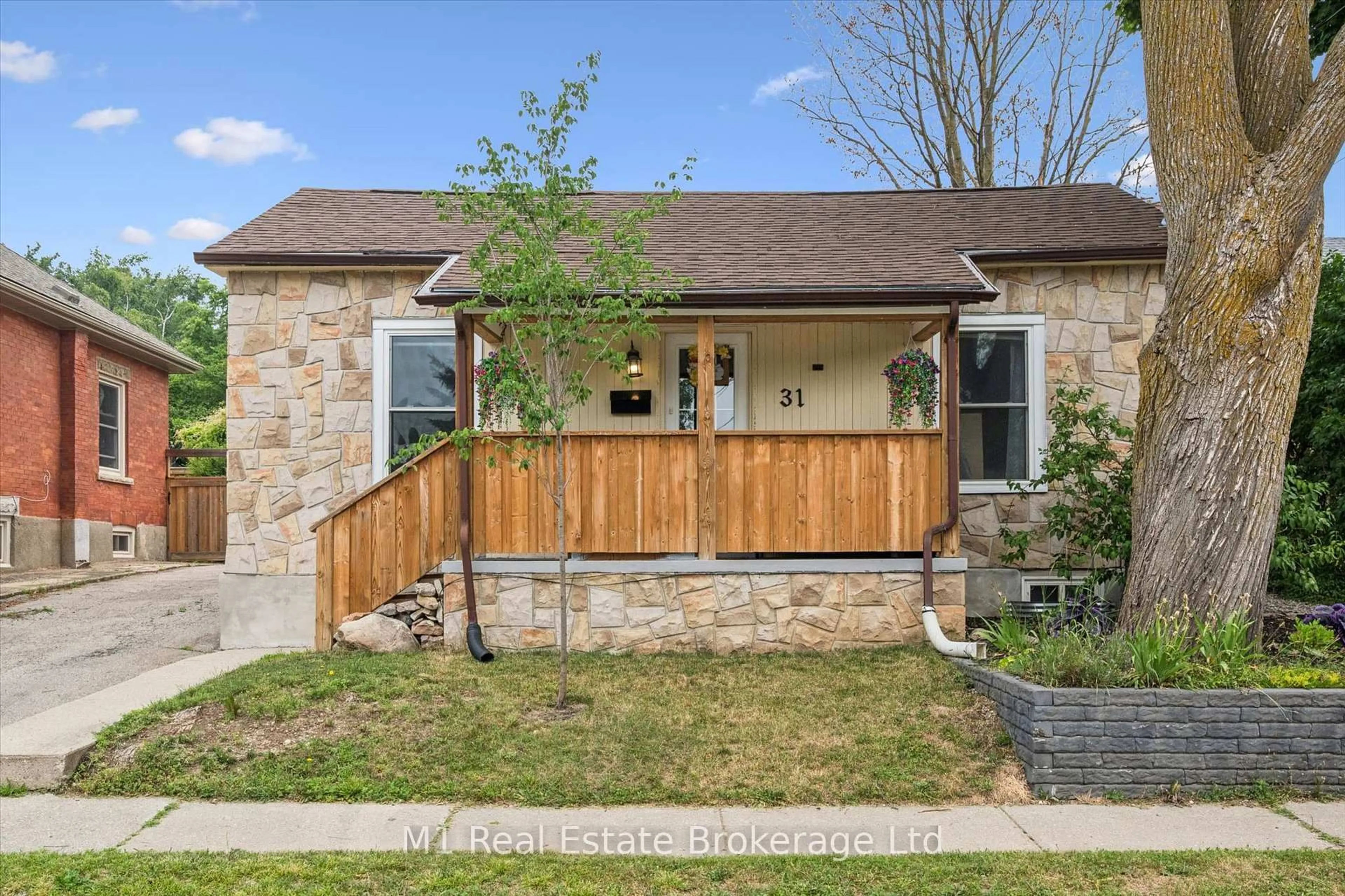 Home with brick exterior material, street for 31 Bagot St, Guelph Ontario N1H 5T2