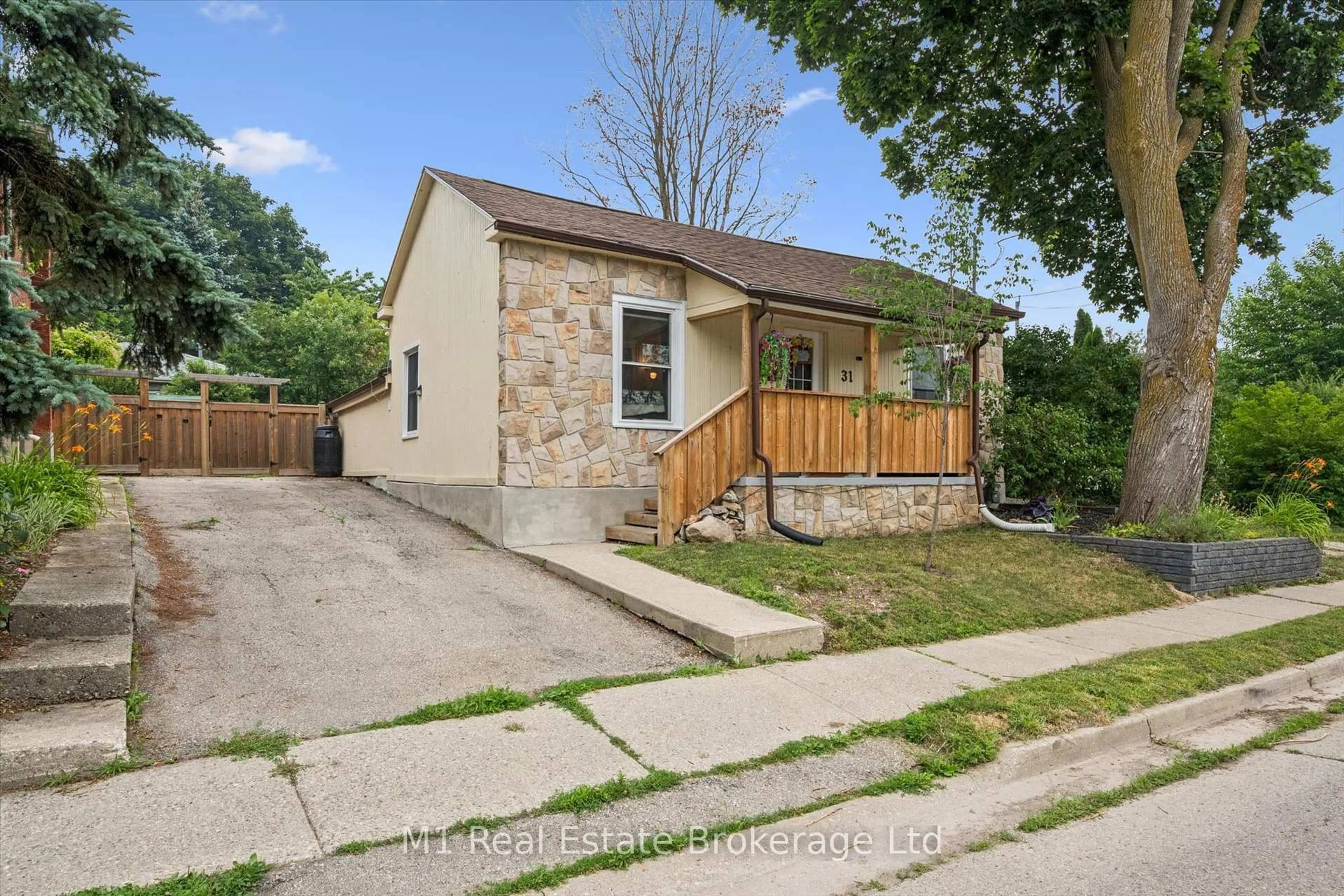 Home with brick exterior material, street for 31 Bagot St, Guelph Ontario N1H 5T2