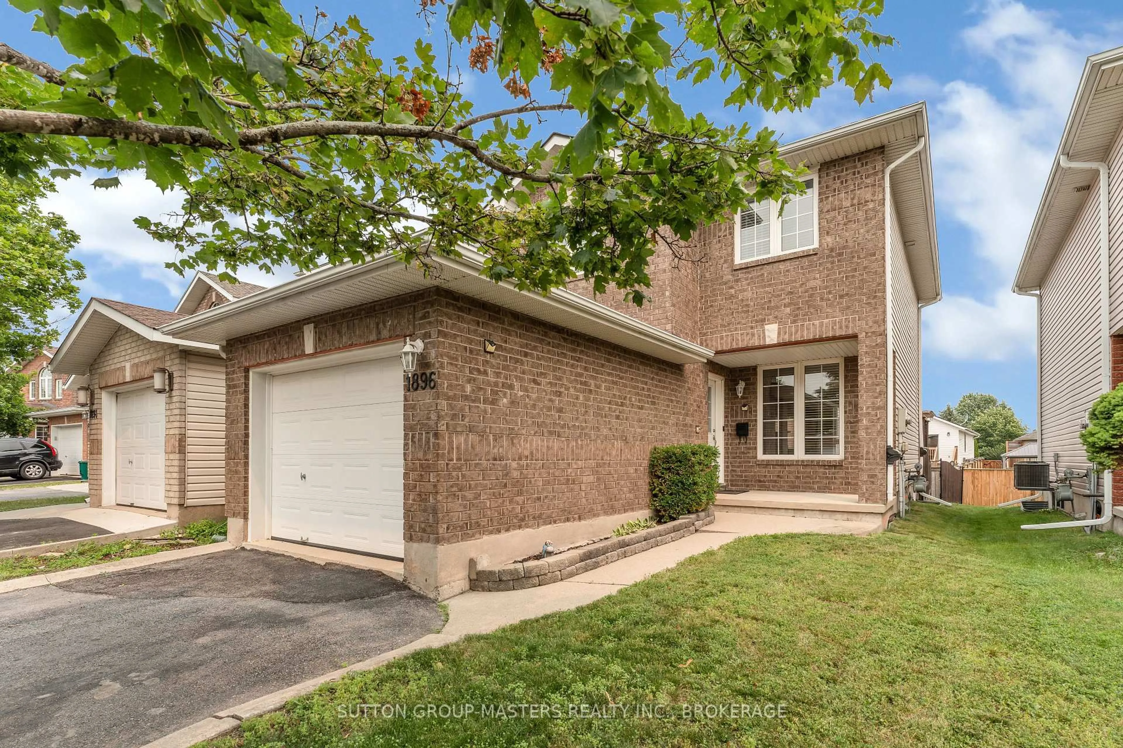 Home with brick exterior material, street for 1896 Berrywood Cres, Kingston Ontario K7P 3G4