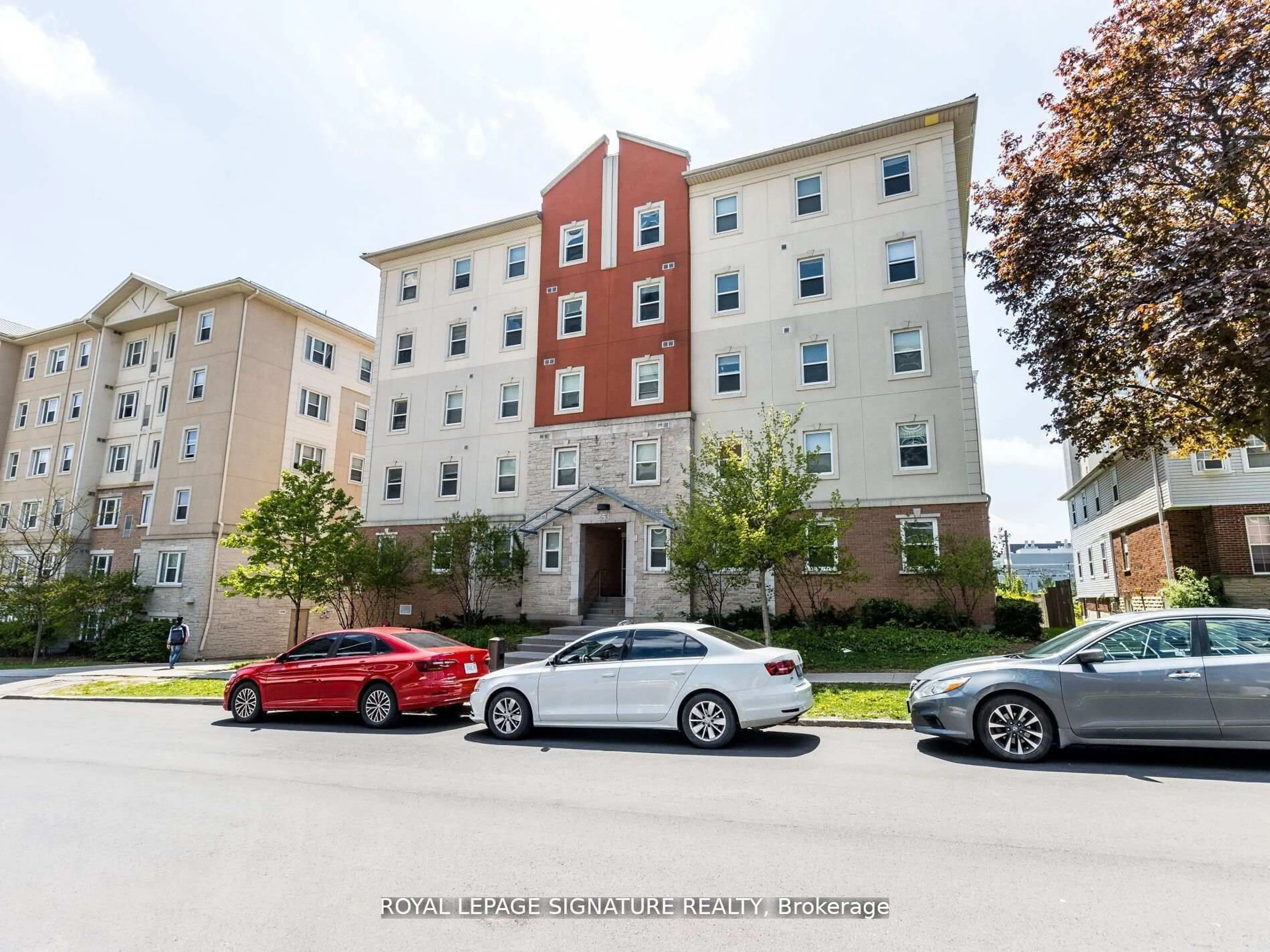 A pic from outside/outdoor area/front of a property/back of a property/a pic from drone, building for 253 Lester St #101, Waterloo Ontario N2L 3W6