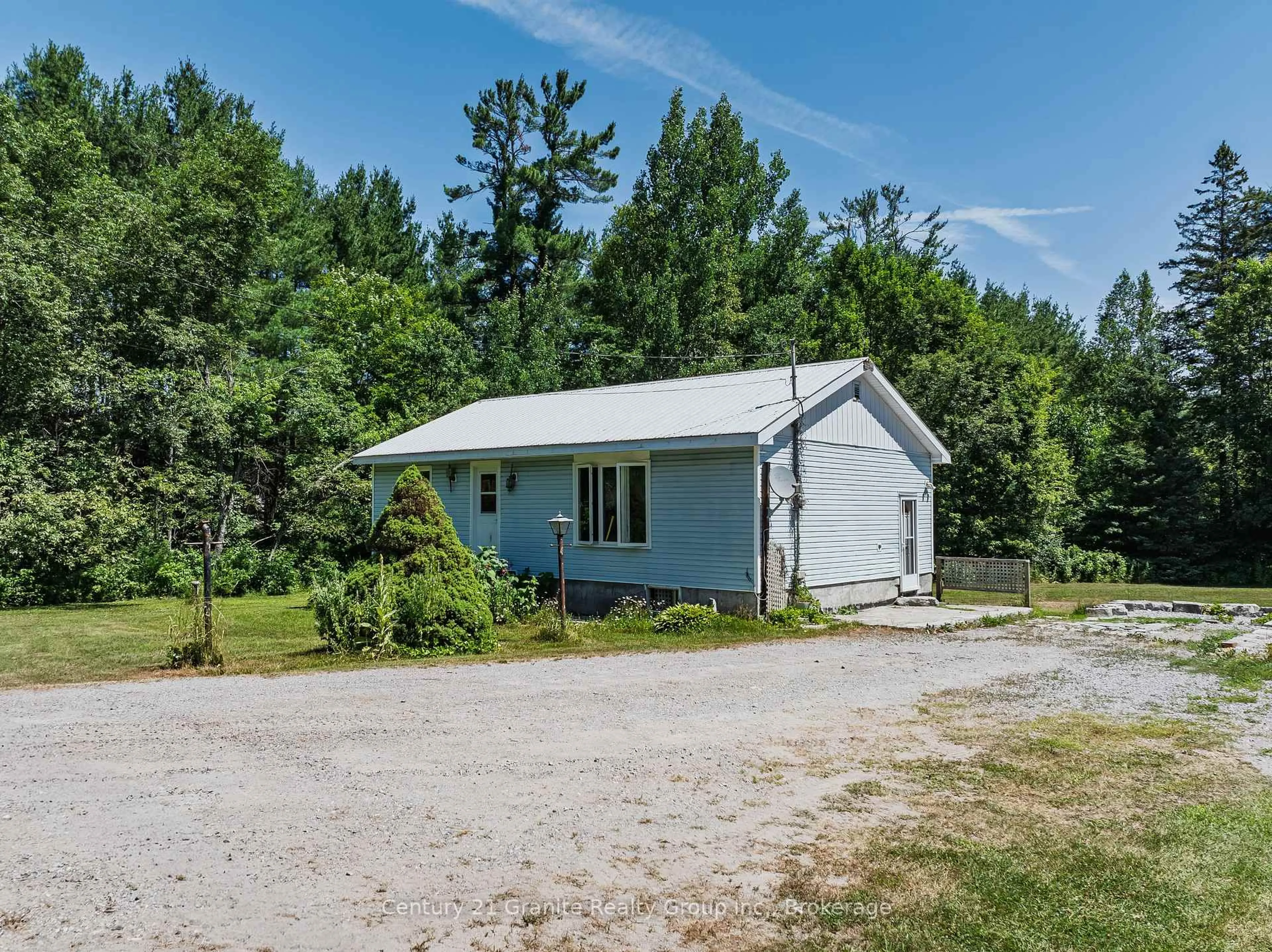 A pic from outside/outdoor area/front of a property/back of a property/a pic from drone, unknown for 4750 County Road 121, Minden Hills Ontario K0M 2A1