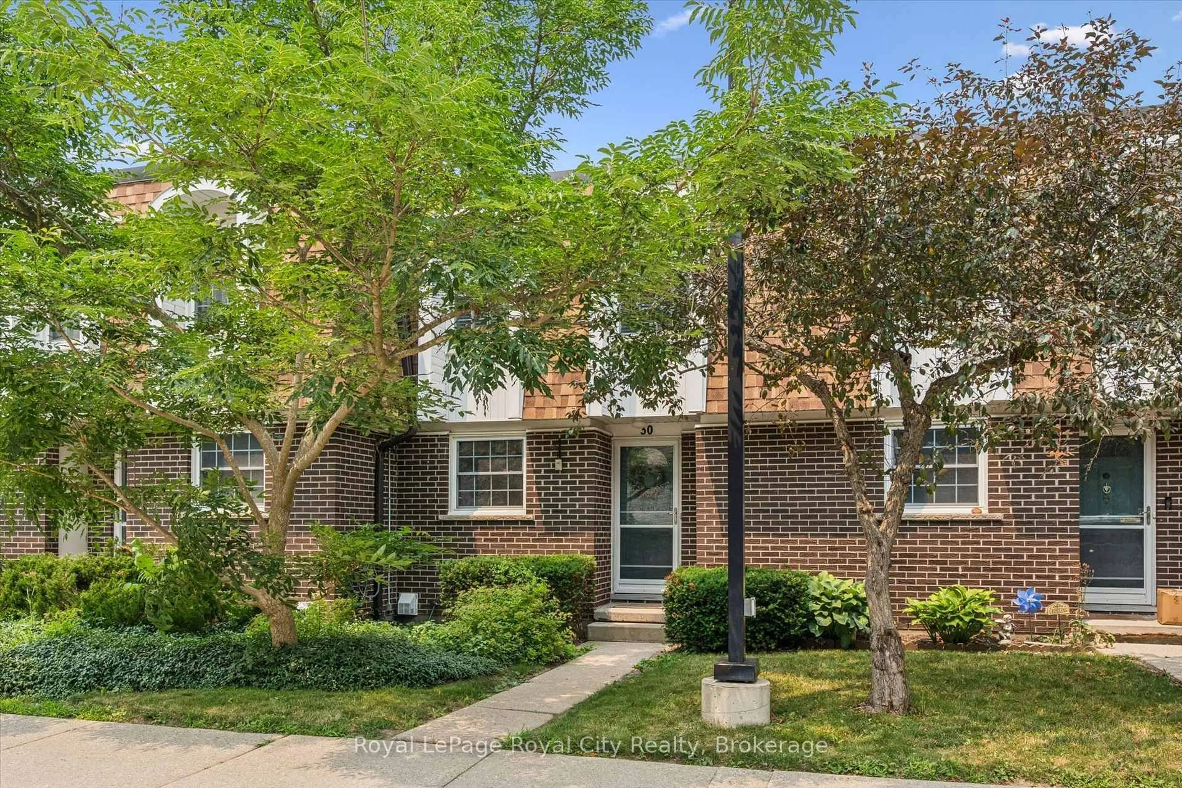 Home with brick exterior material, street for 383 Edinburgh Rd #30, Guelph Ontario N1G 2K7