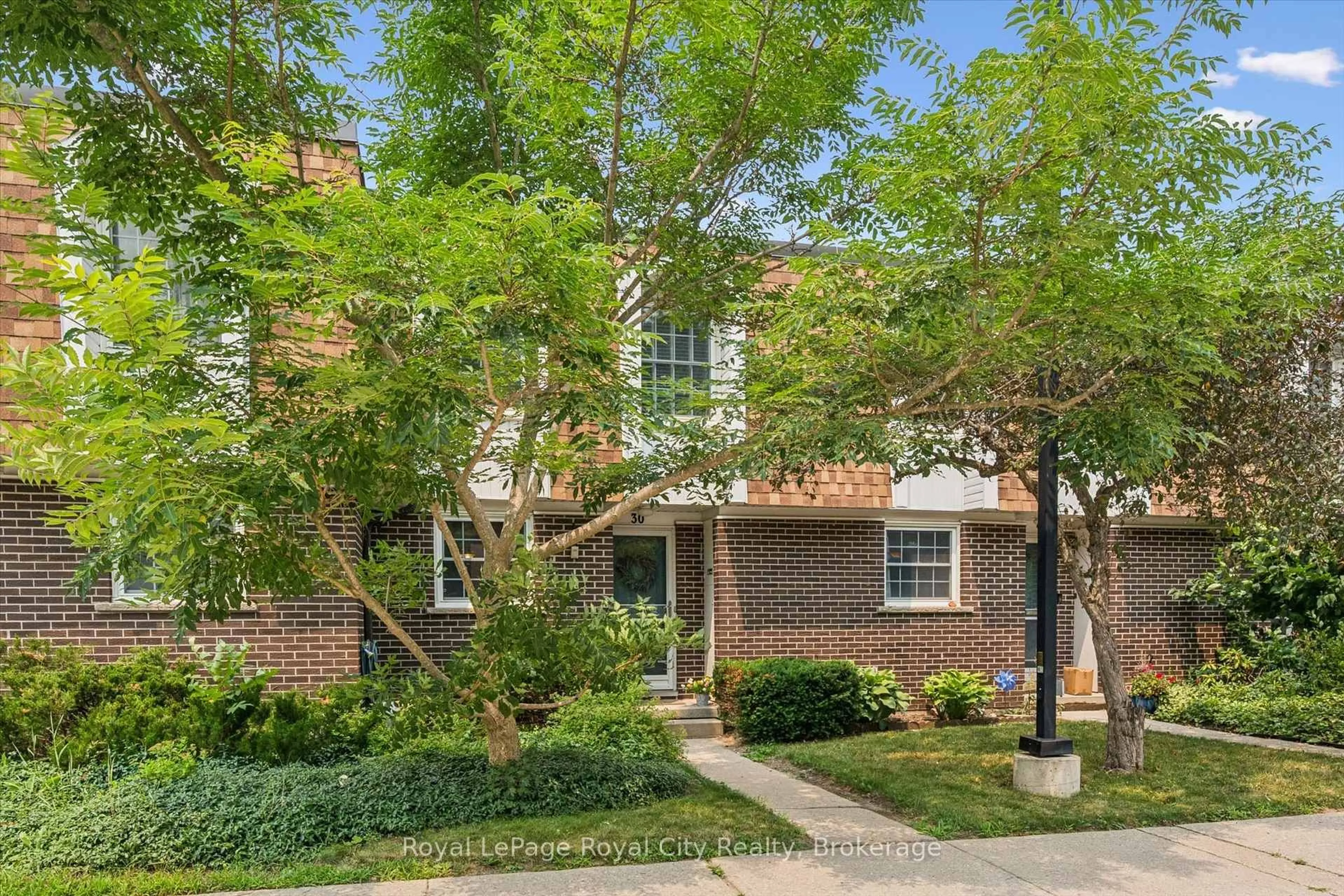 Home with brick exterior material, street for 383 Edinburgh Rd #30, Guelph Ontario N1G 2K7